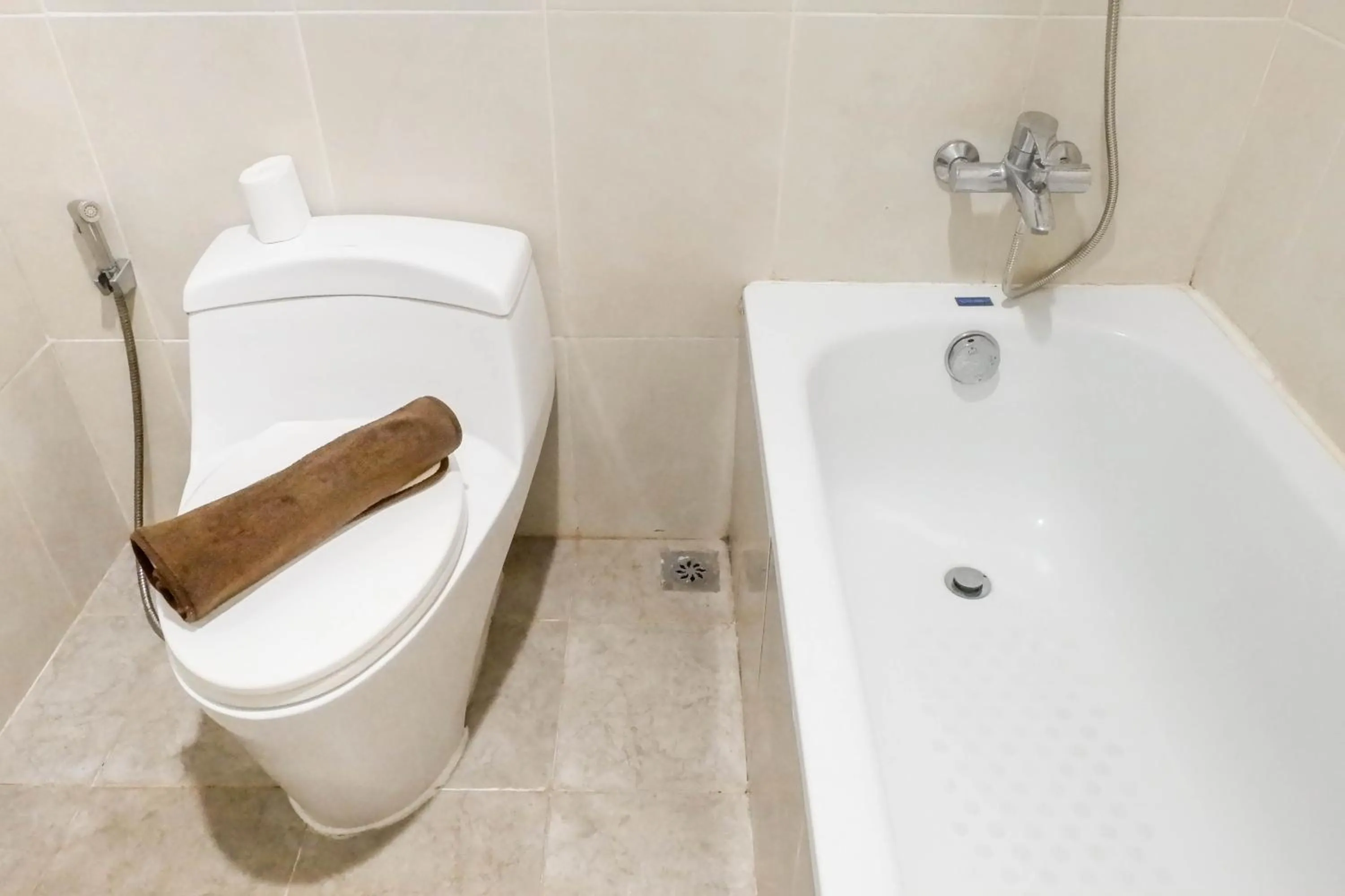 Bathroom in Scenic Modern 2BR Apartment at Trillium Residence By Travelio