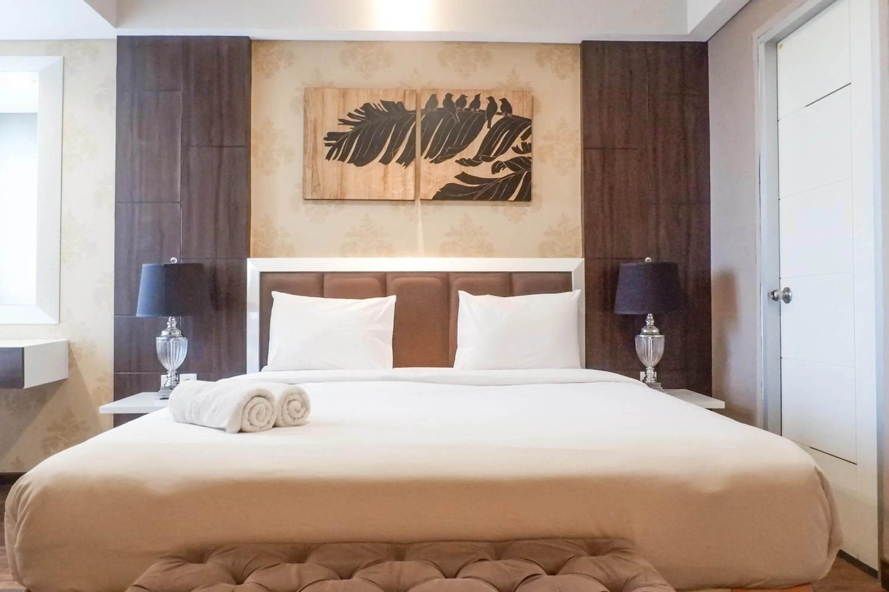 Bed in Scenic Modern 2BR Apartment at Trillium Residence By Travelio