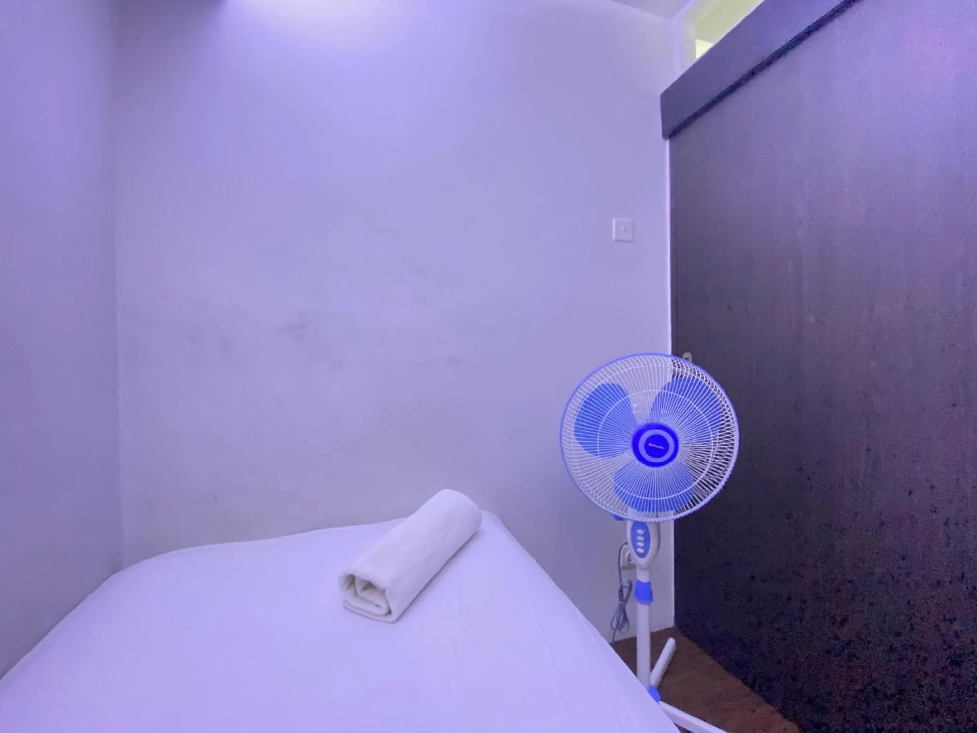 Bed in Quite 2BR Apartment AC in Living Room at The Jarrdin Cihampelas By Travelio