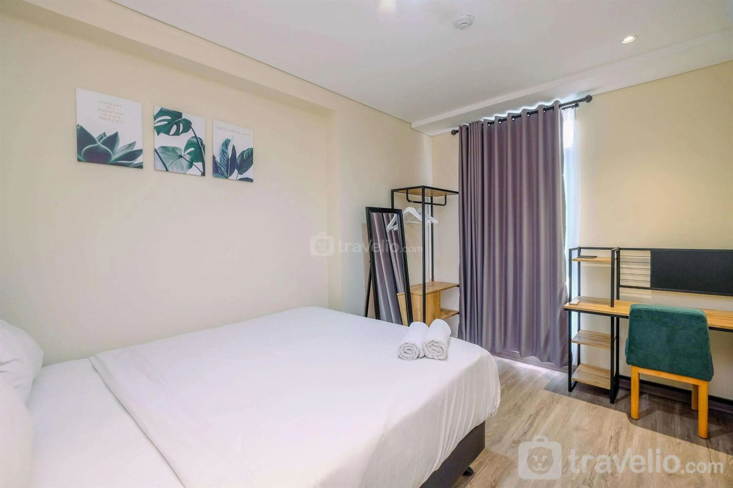 Bed in Simply 1BR Apartment at Pejaten Park Residence By Travelio