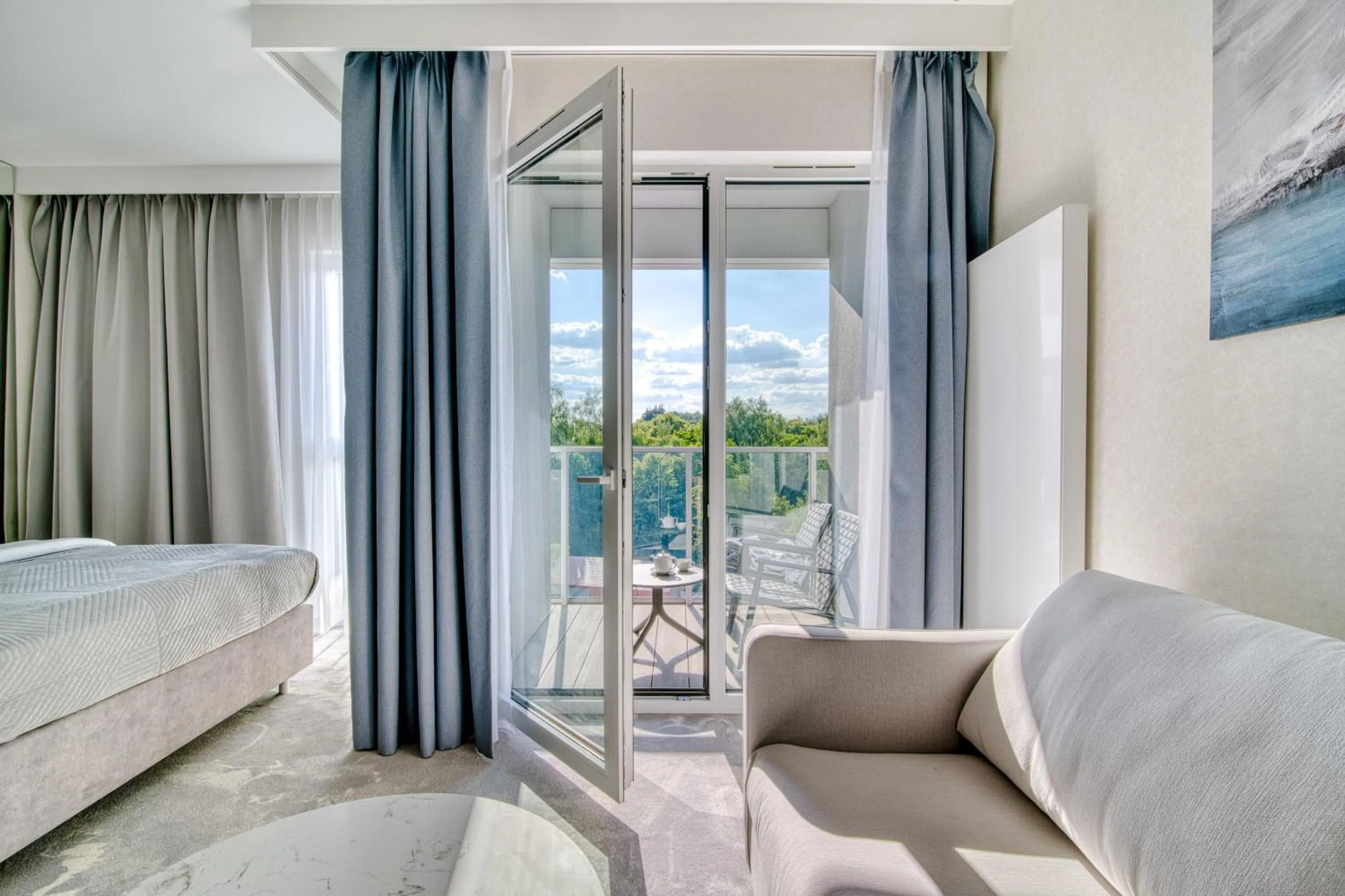 Communal lounge/ TV room, Bed in Apartamenty Premium N11 Mikołajki - Destigo Hotels