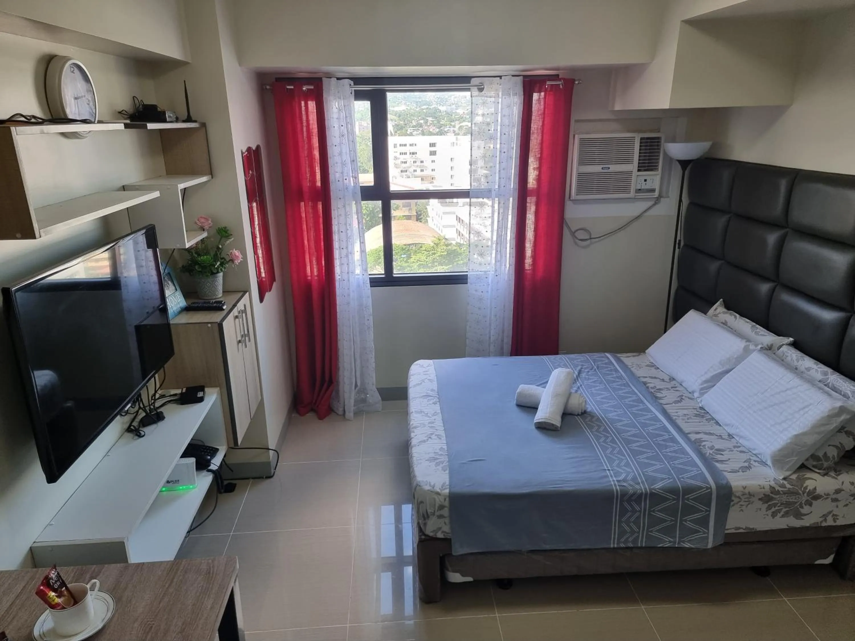 Bed in Studio Condo Unit at Horizons 101