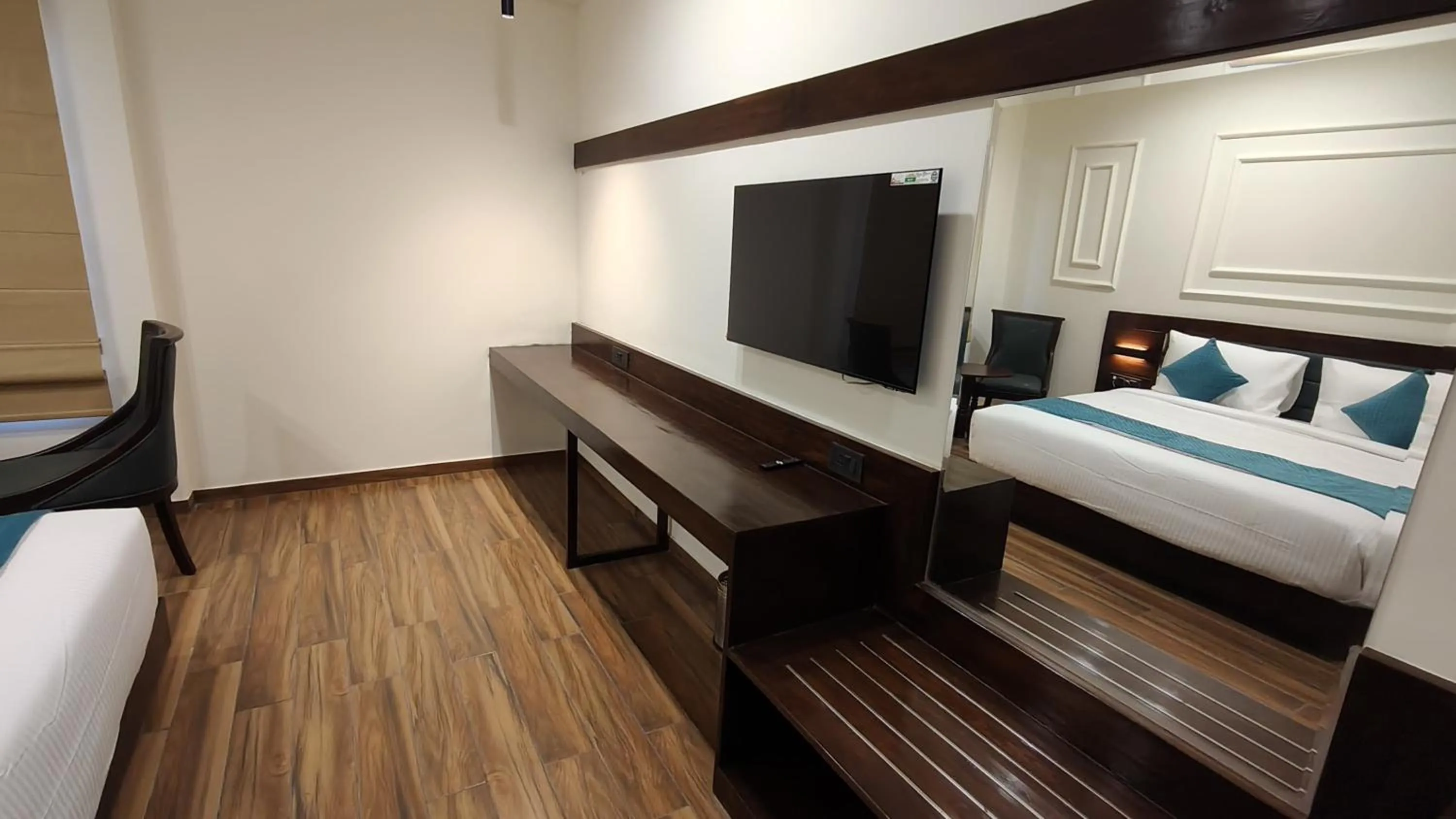 TV and multimedia, Bed in The Belita Hotel & Spa