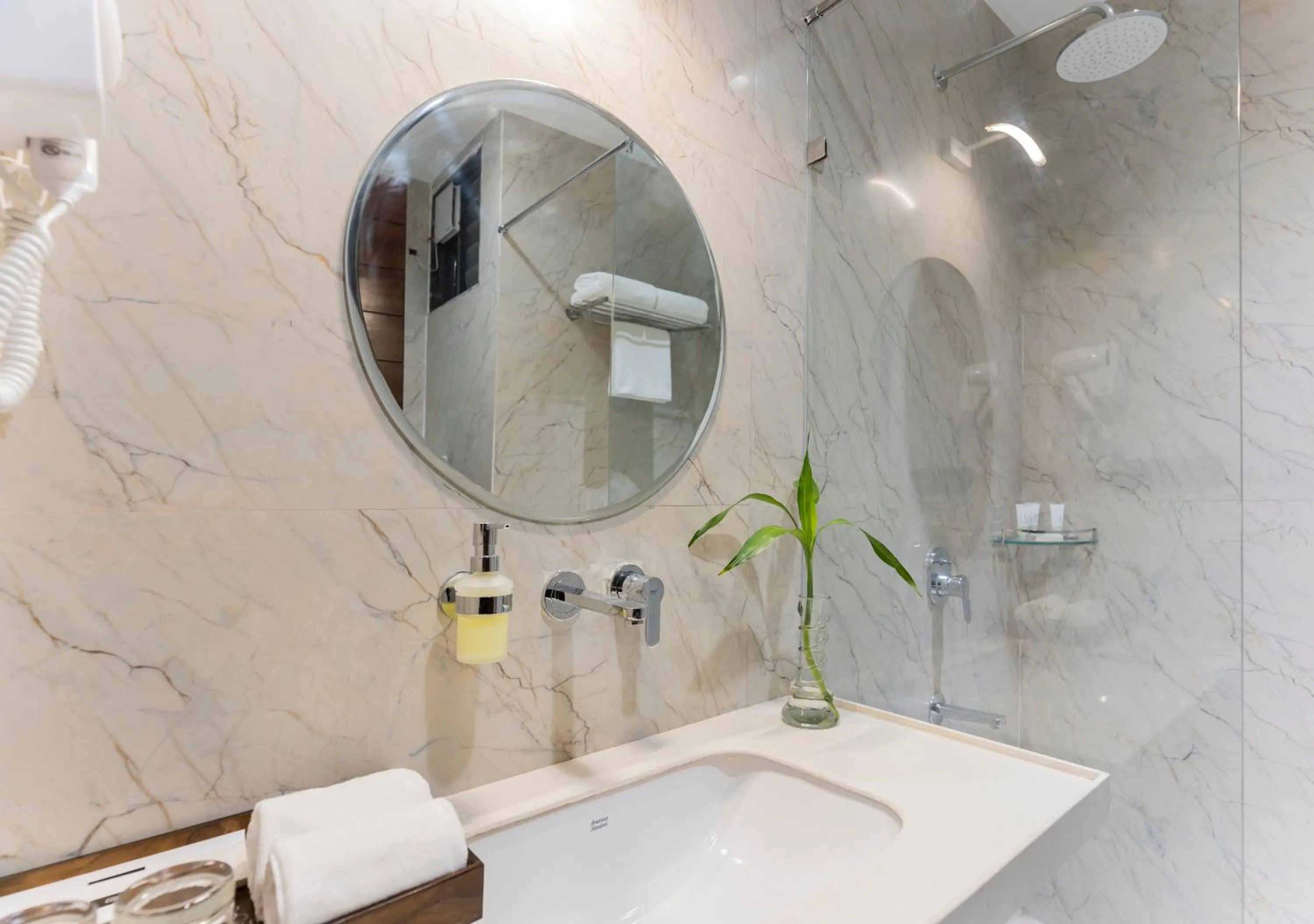 Shower in The Belita Hotel & Spa