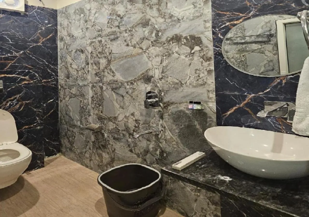 Toilet in Triveni International