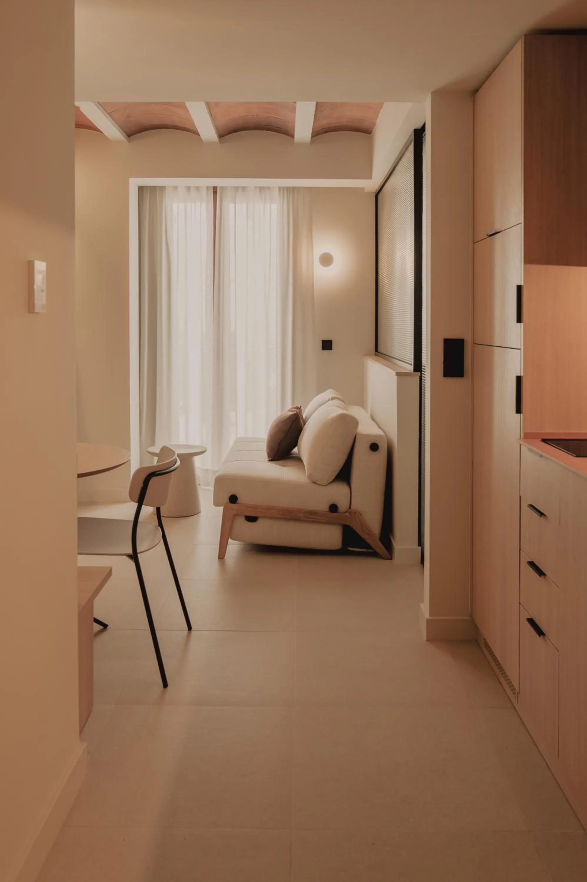 Living room, Bed in Pau Suites