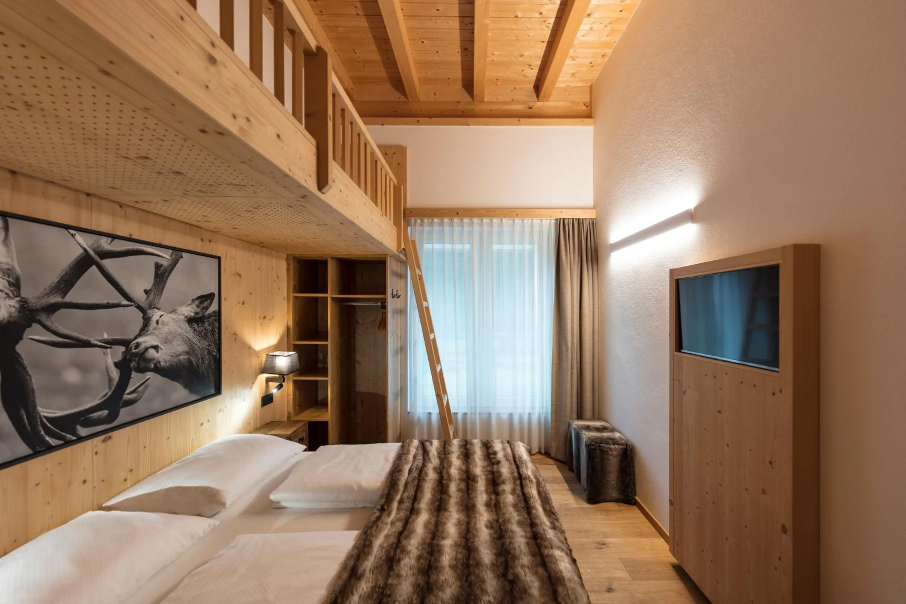 Photo of the whole room, Bed in ArlBerglife Ferienresort