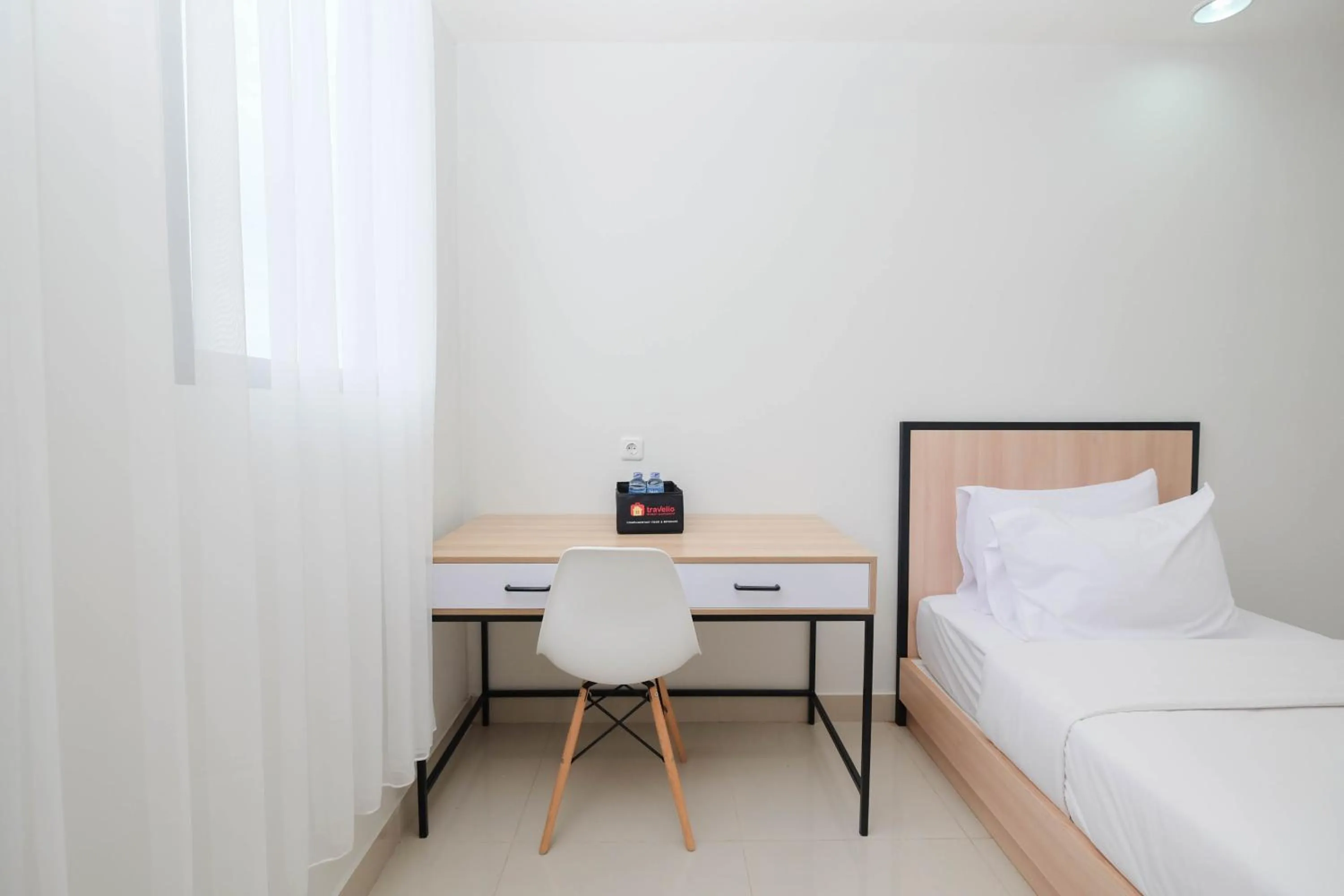 Pleasurable Studio at Evenciio Apartment near Campus Area By Travelio