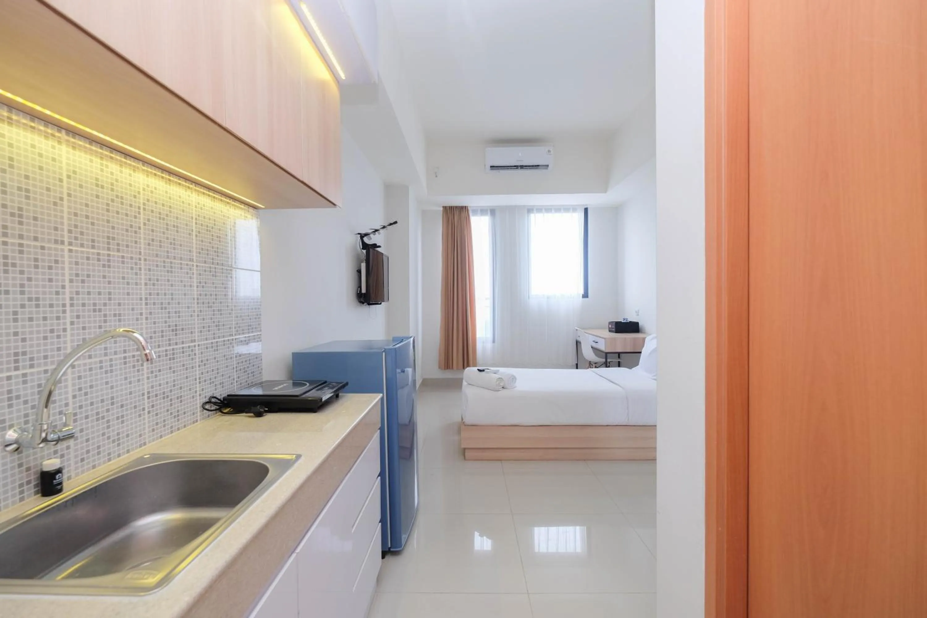 Pleasurable Studio at Evenciio Apartment near Campus Area By Travelio