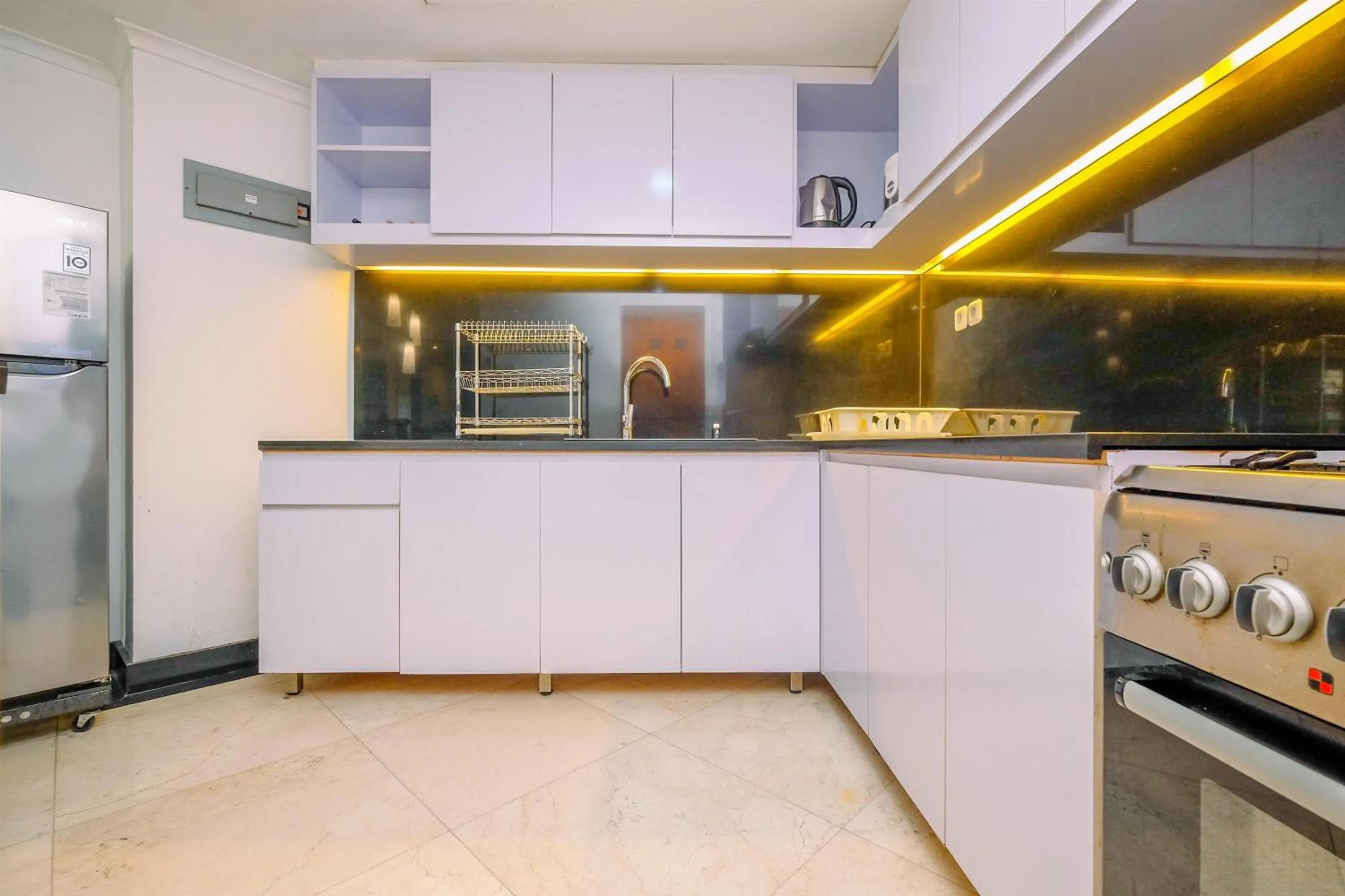 Comfort 2BR + Extra Room at Sudirman Tower Condominium Apartment By Travelio