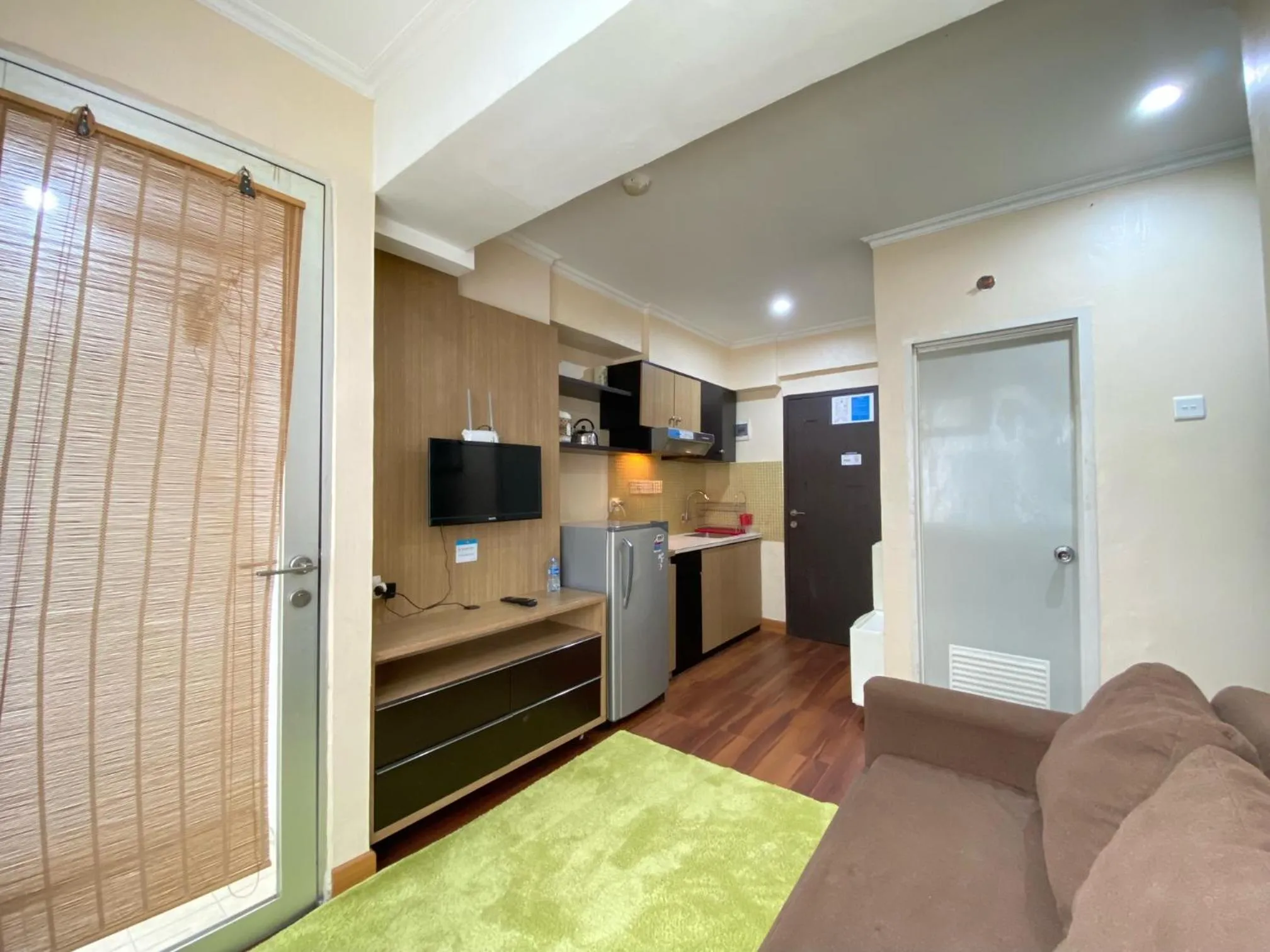 Cozy Living 2BR Apartment at Jarrdin Cihampelas By Travelio