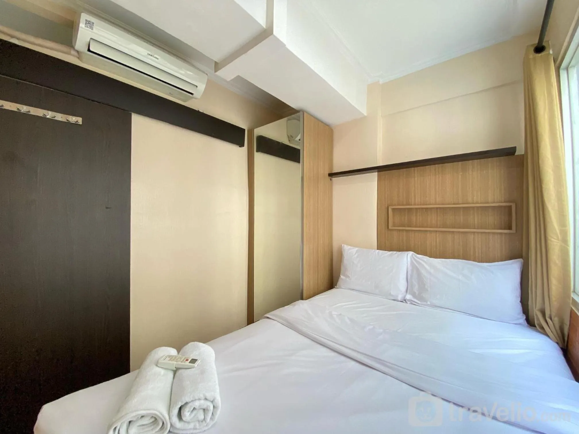 Bedroom, Bed in Cozy Living 2BR Apartment at Jarrdin Cihampelas By Travelio