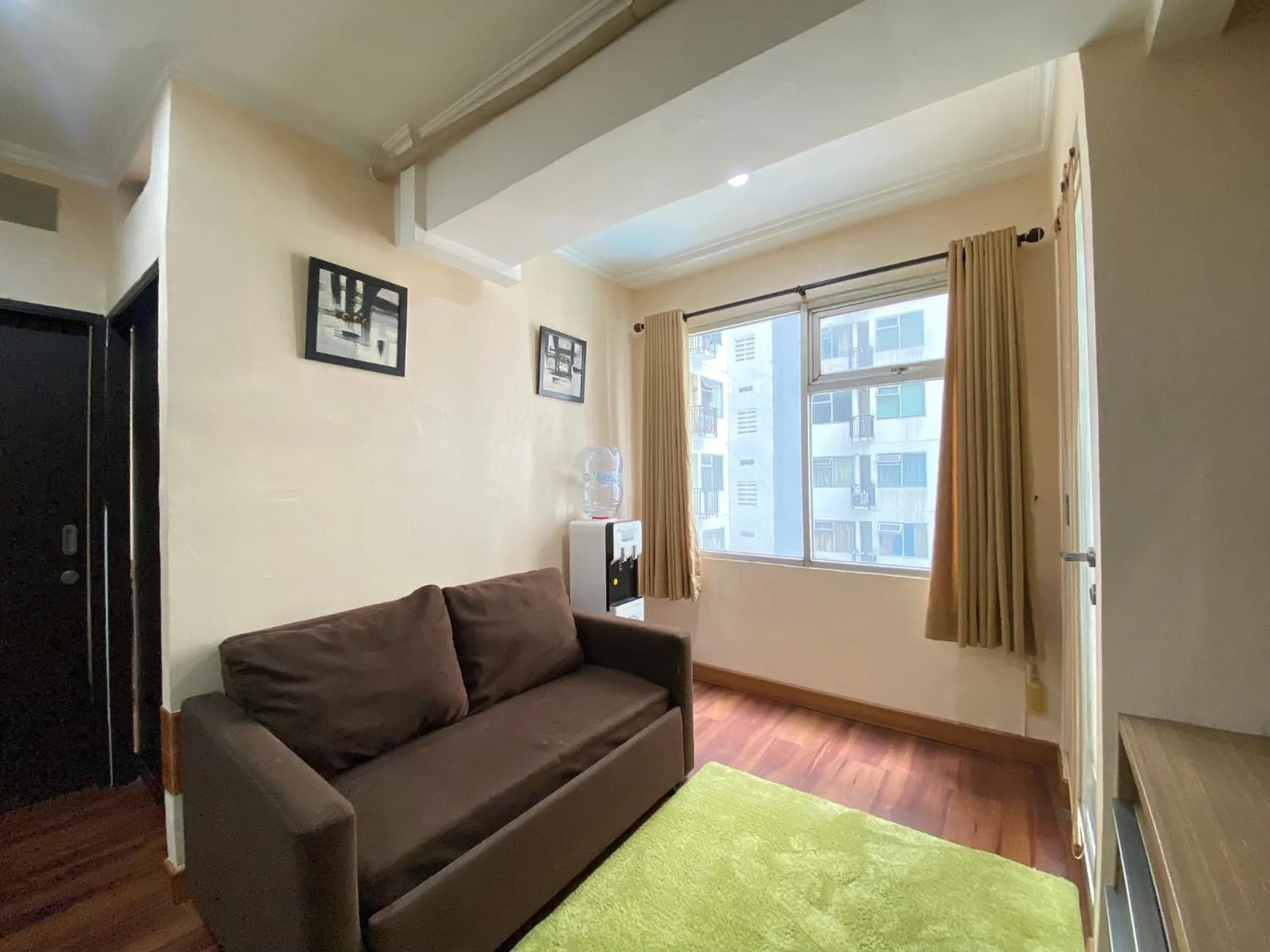 Cozy Living 2BR Apartment at Jarrdin Cihampelas By Travelio