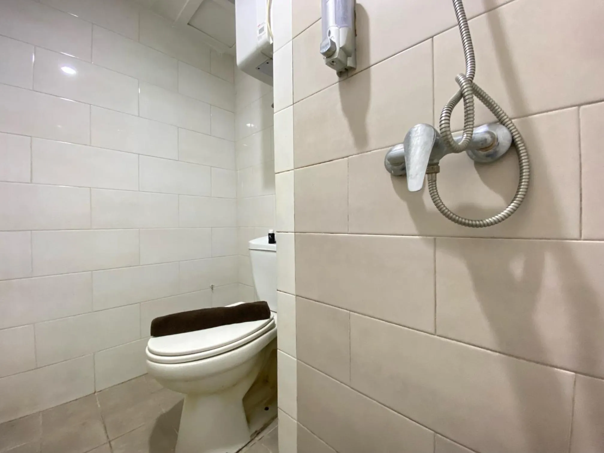 Cozy Living 2BR Apartment at Jarrdin Cihampelas By Travelio