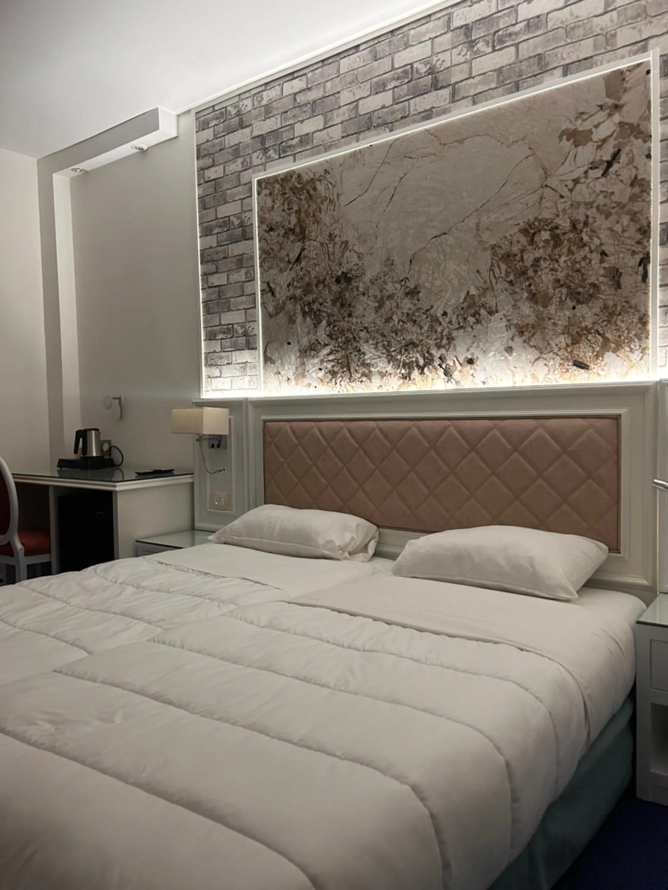 Bed in Hotel Grand Paris