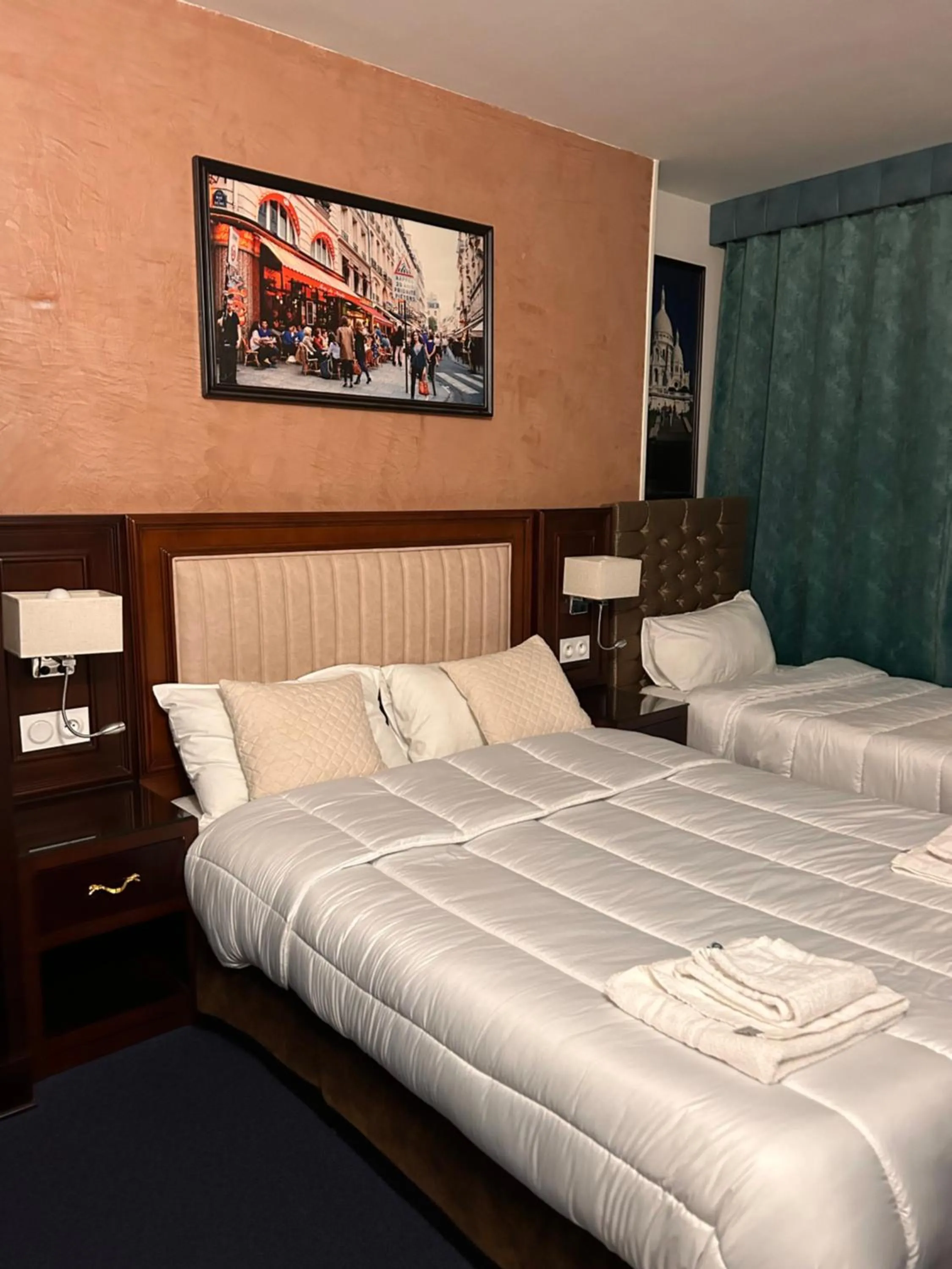 Bed in Hotel Grand Paris