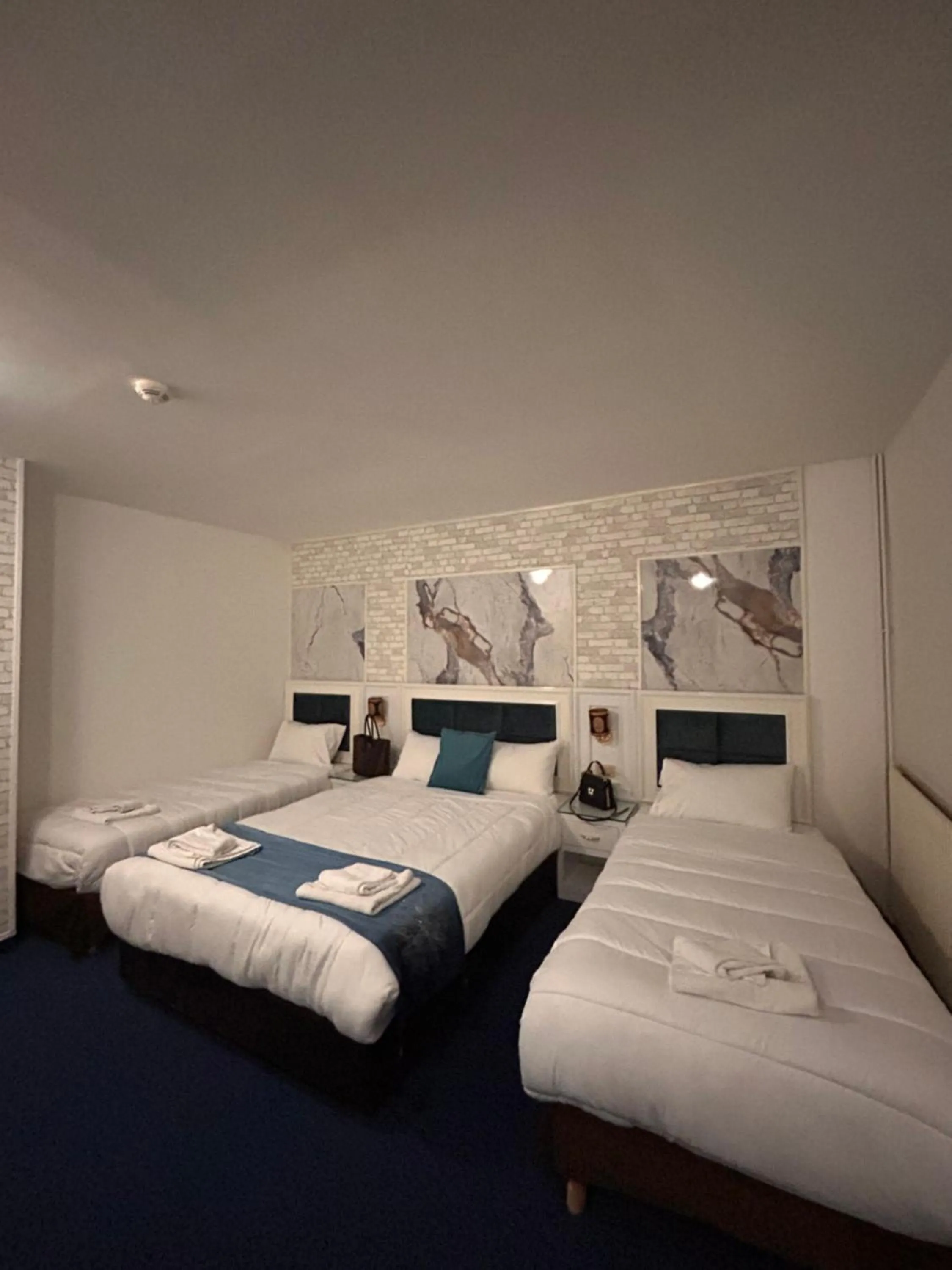 Bed in Hotel Grand Paris