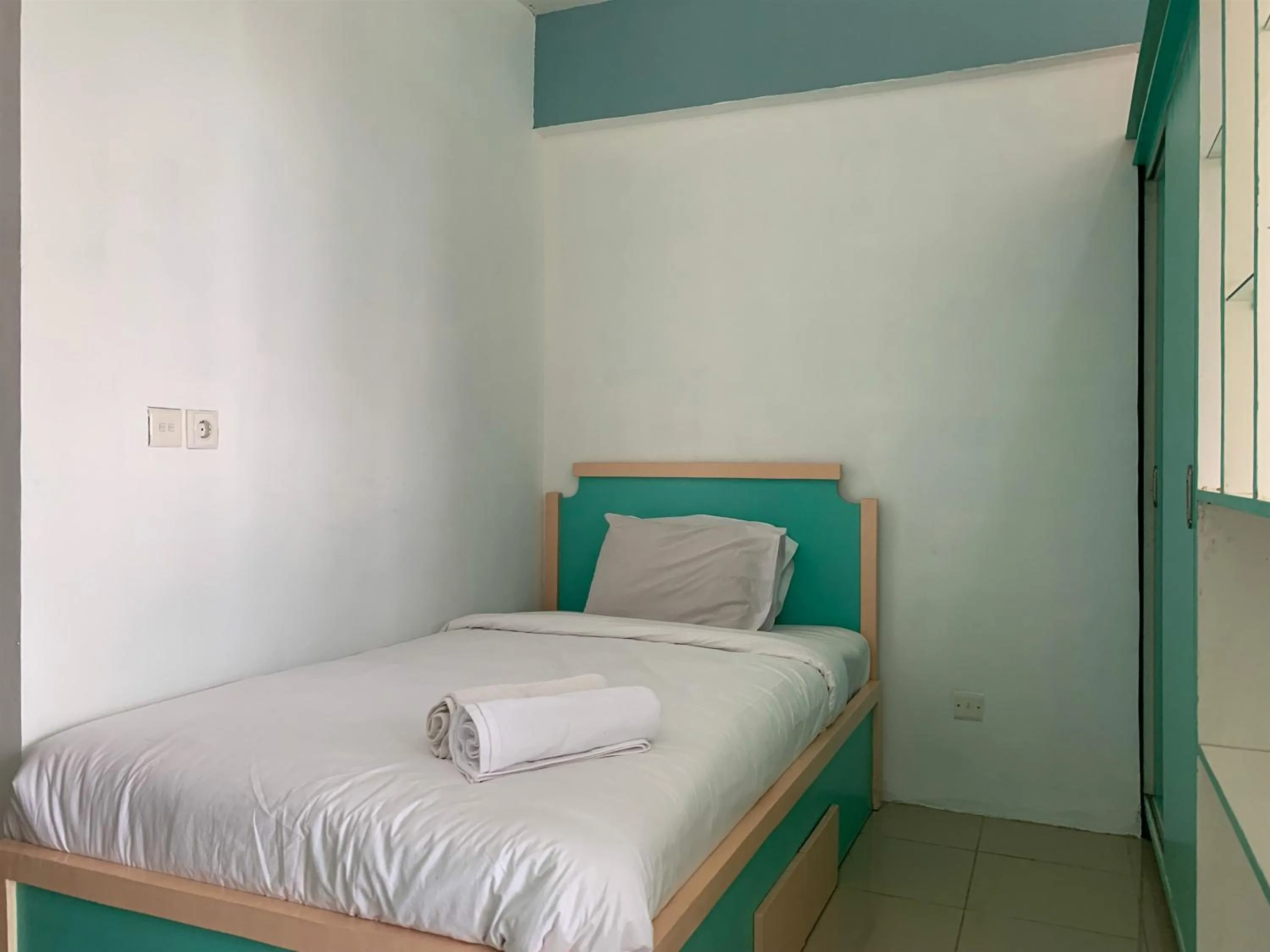 Bed in Cozy Studio at Park View Condominium Apartment By Travelio