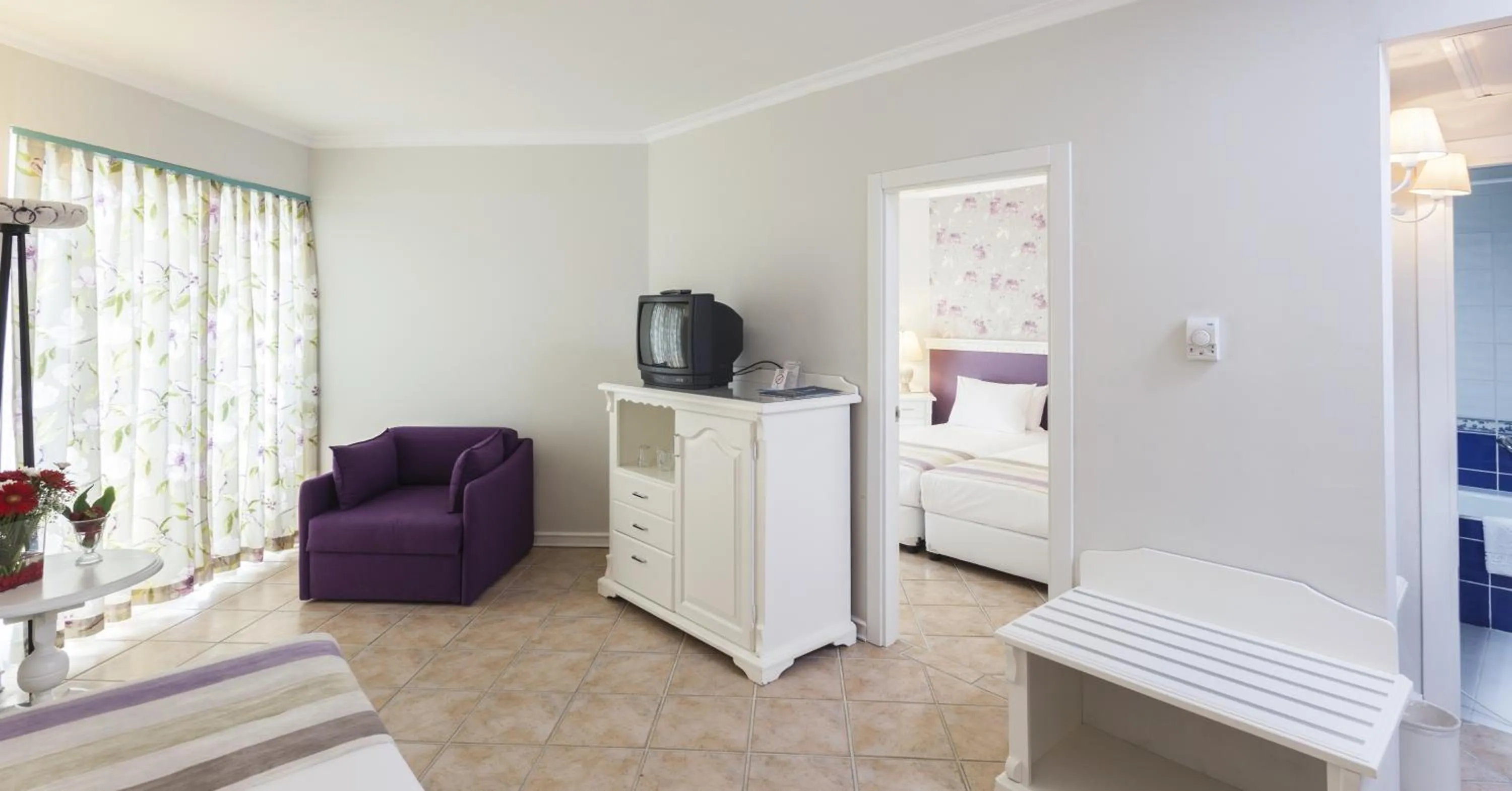 Photo of the whole room, Bed in Iz Flower Side Beach Hotel