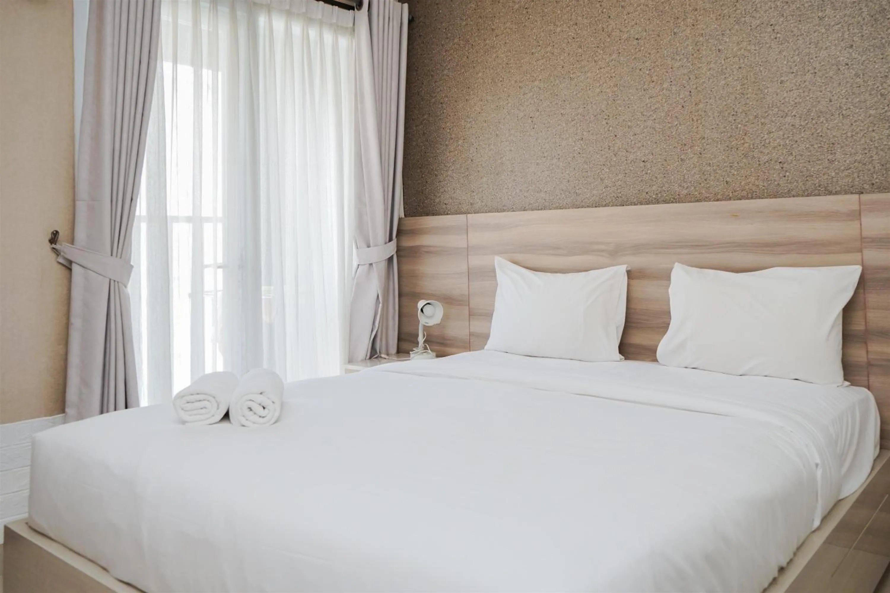 Bedroom, Bed in Cozy Stay Studio at Paramount Skyline Apartment By Travelio