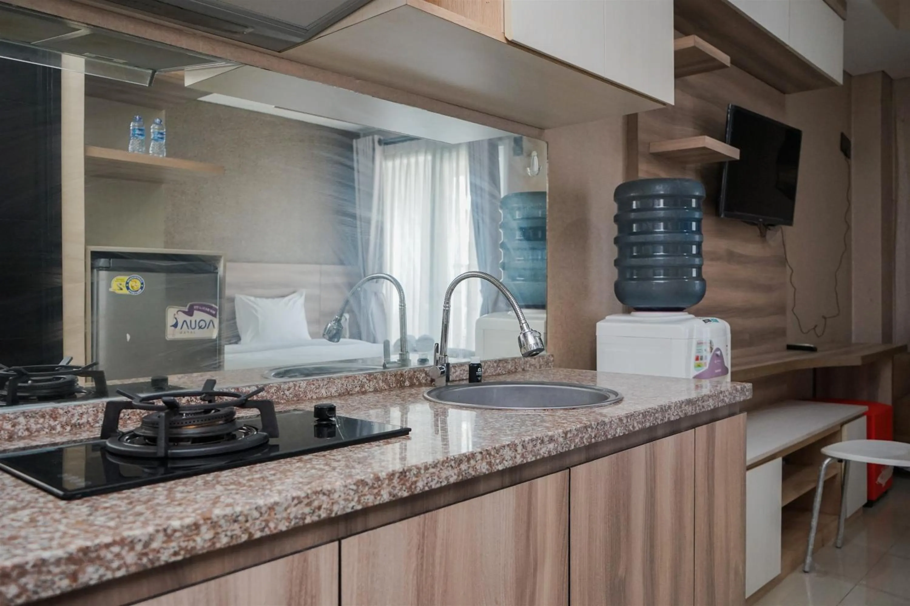 Cozy Stay Studio at Paramount Skyline Apartment By Travelio