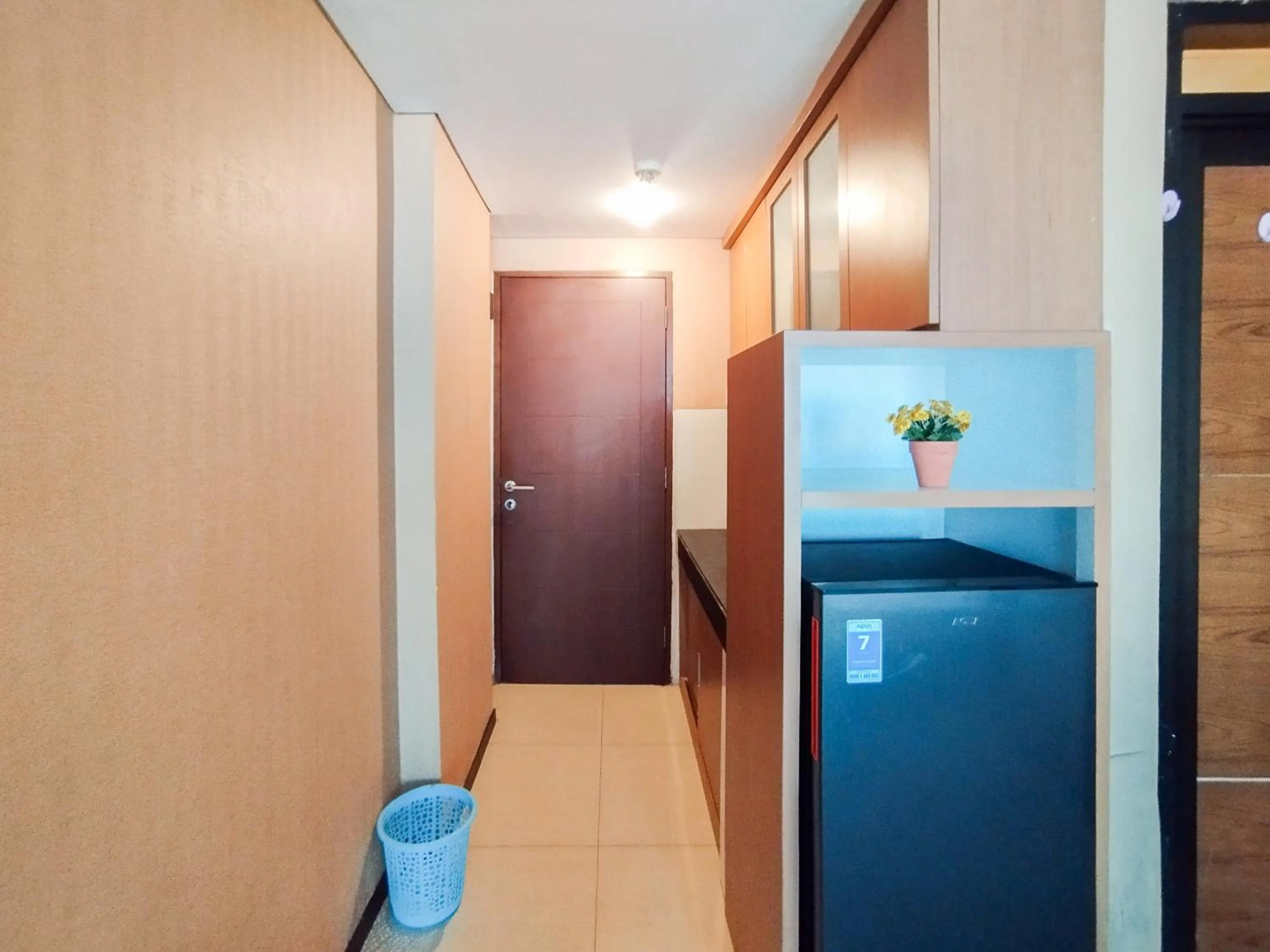 Kitchen or kitchenette in Spacious Chic Studio Room Apartment at Gateway Pasteur By Travelio