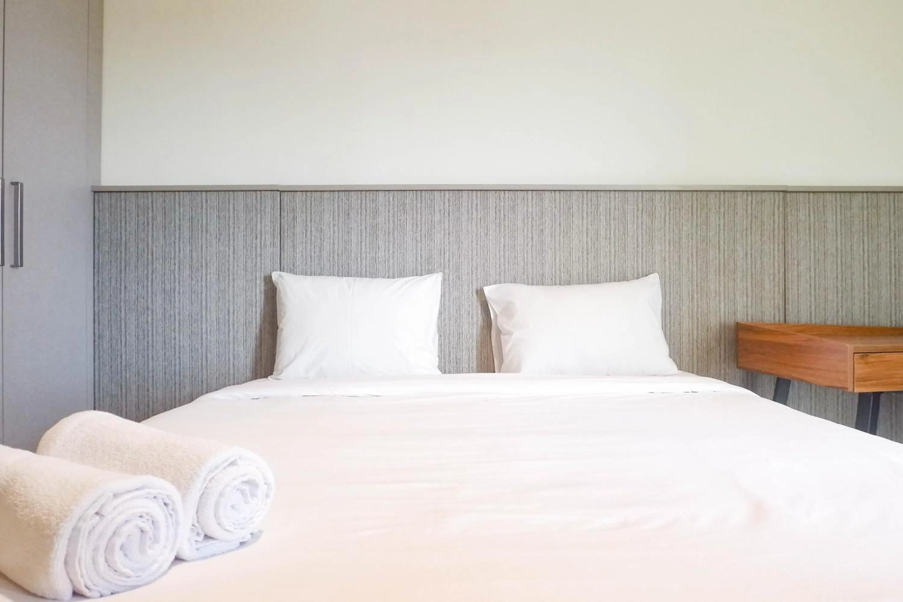 Bed in 1BR Stunning and Cozy Apartment at Praxis By Travelio