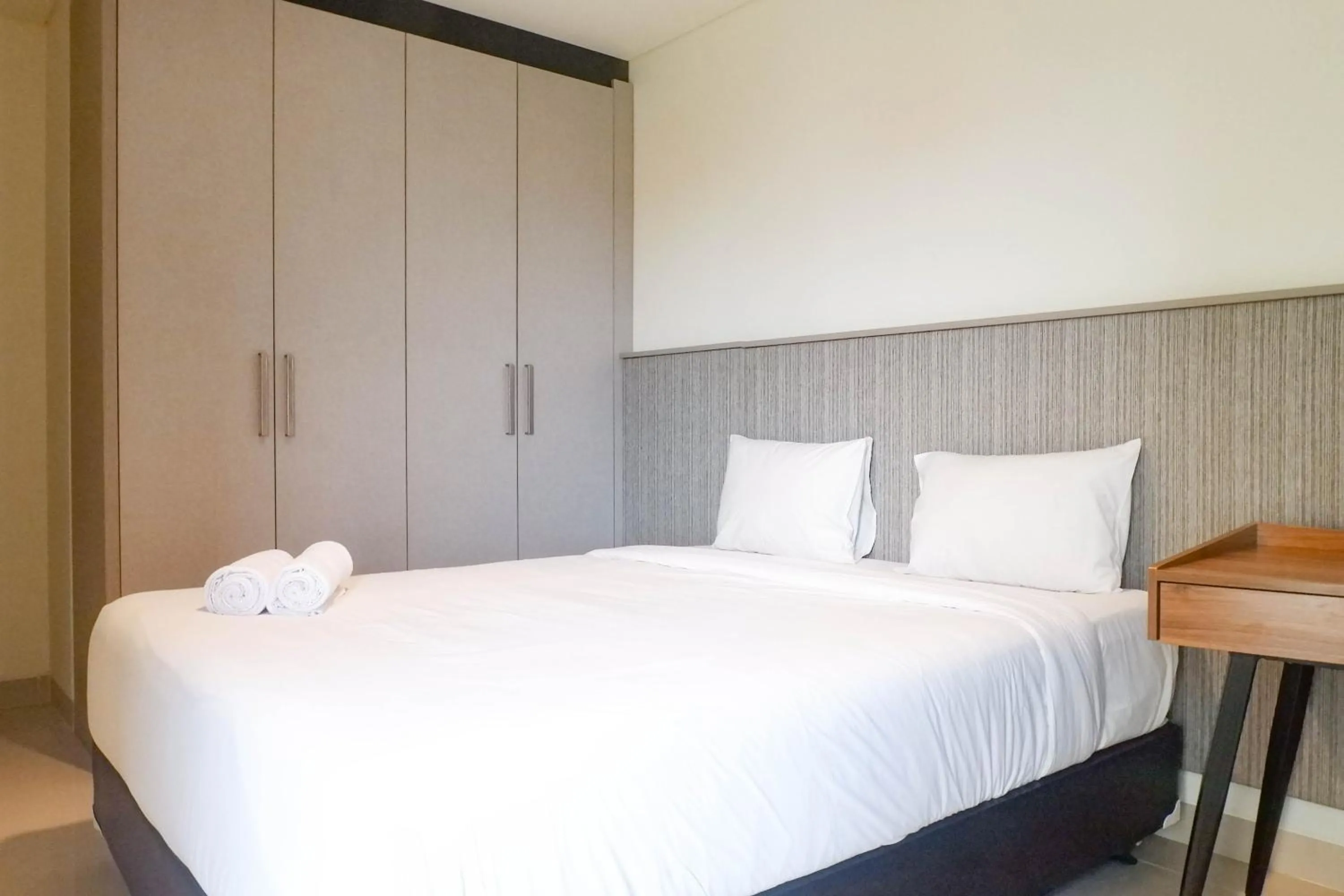 Bed in 1BR Stunning and Cozy Apartment at Praxis By Travelio