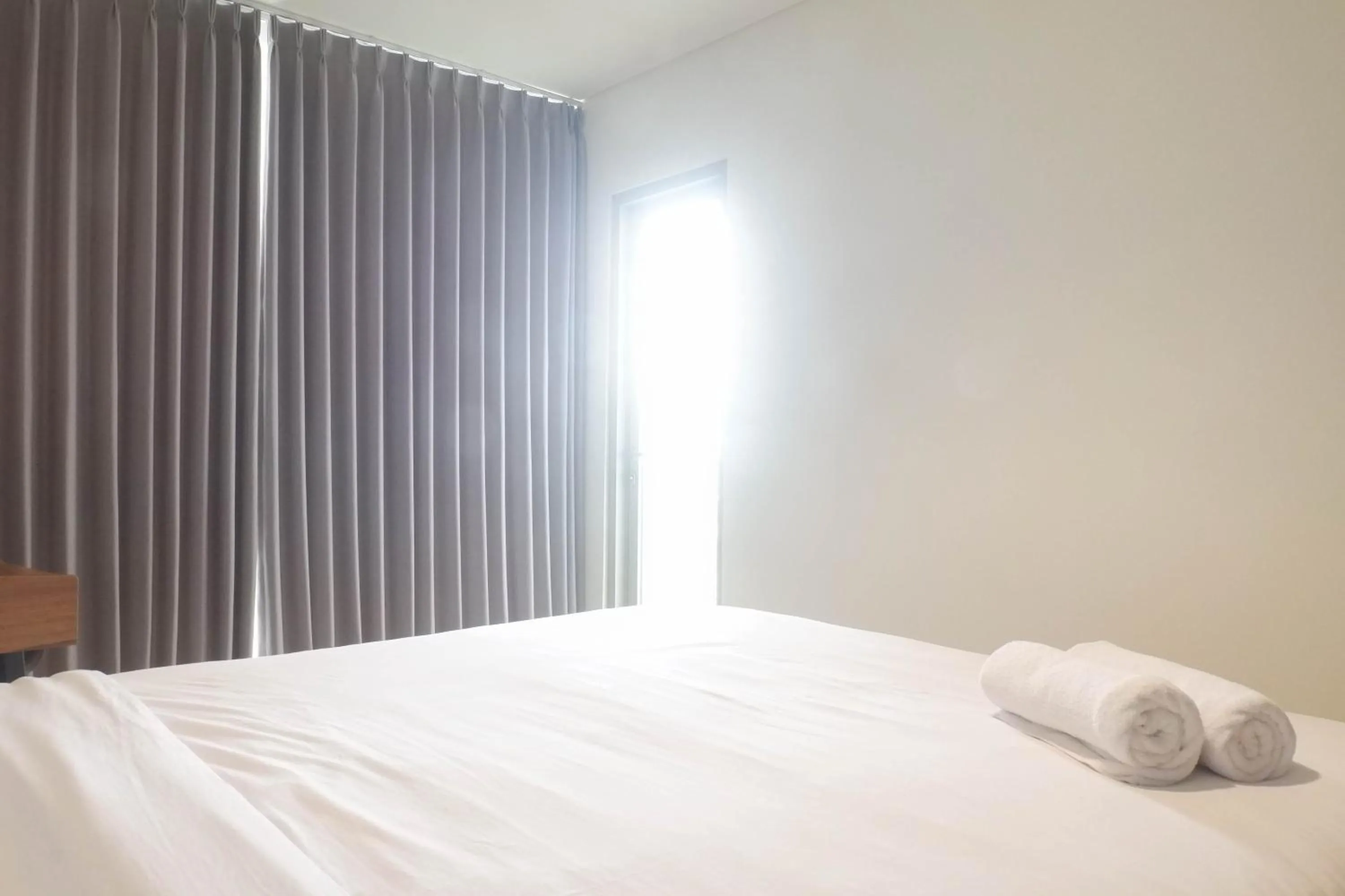 Bed in 1BR Stunning and Cozy Apartment at Praxis By Travelio