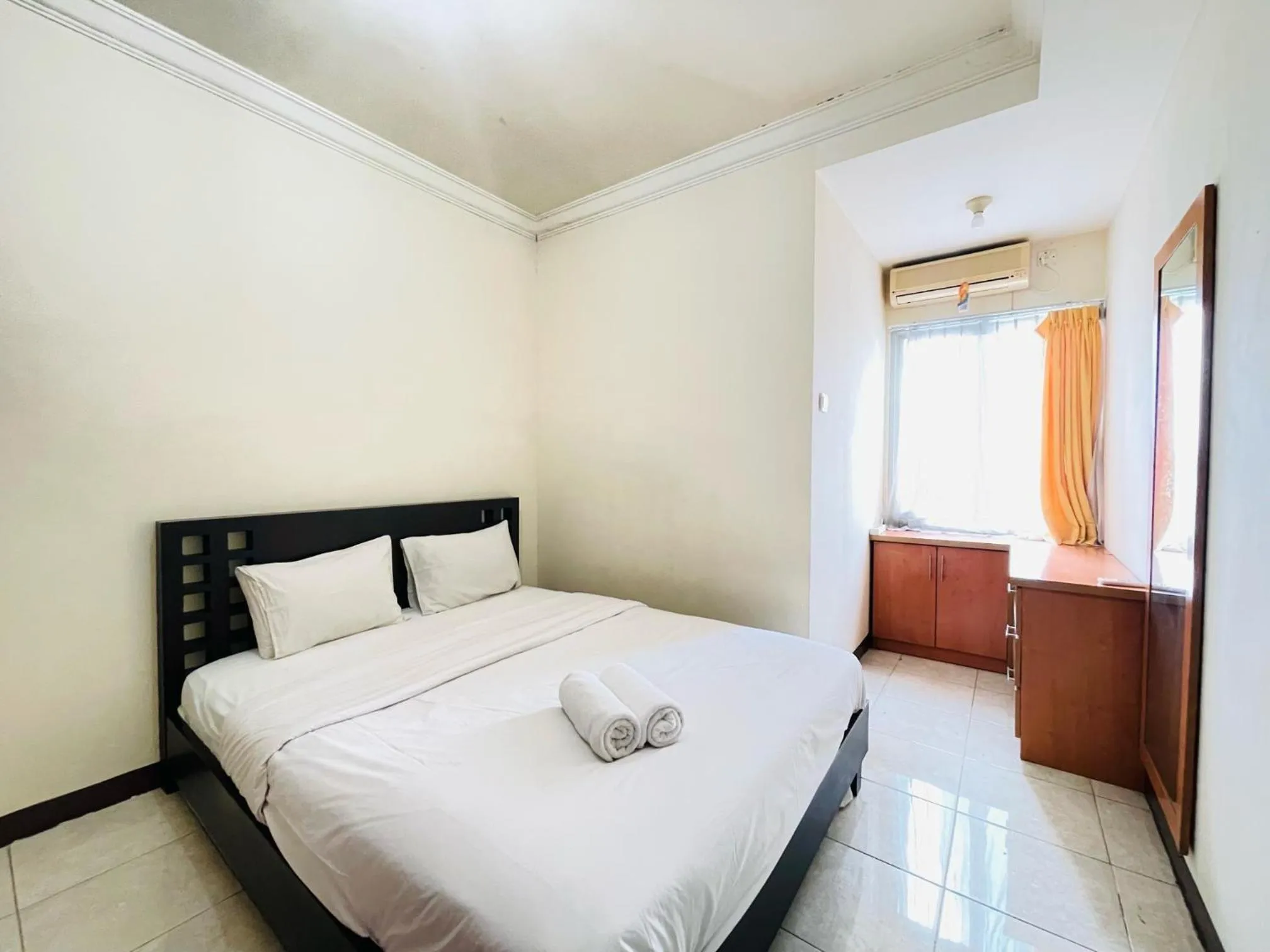 Bedroom in Executive Private 2BR at Galeri Ciumbuleuit 1 Apartement By Travelio