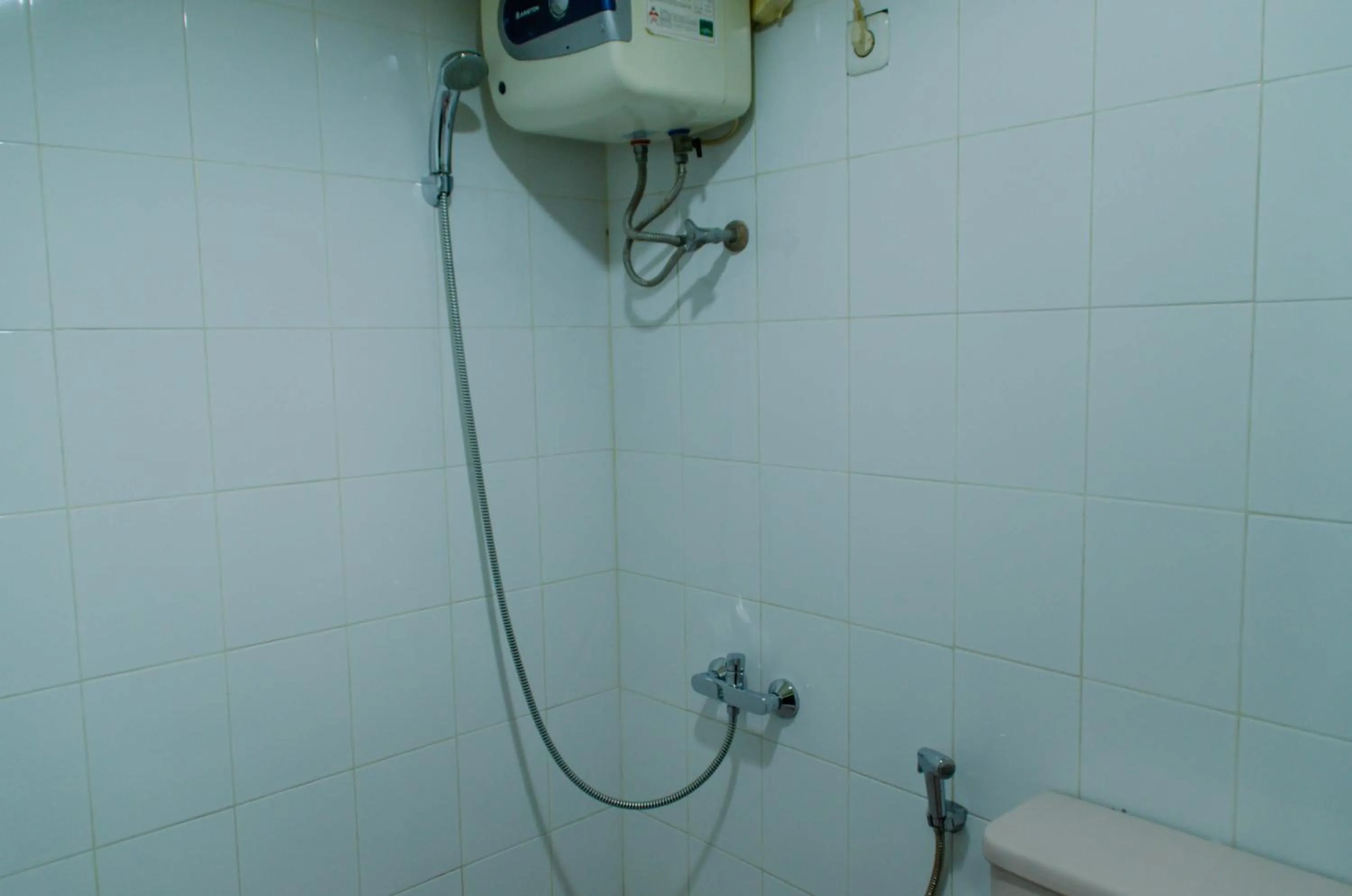 Spacious and Homey 3BR at Kondominium Rajawali Apartment By Travelio