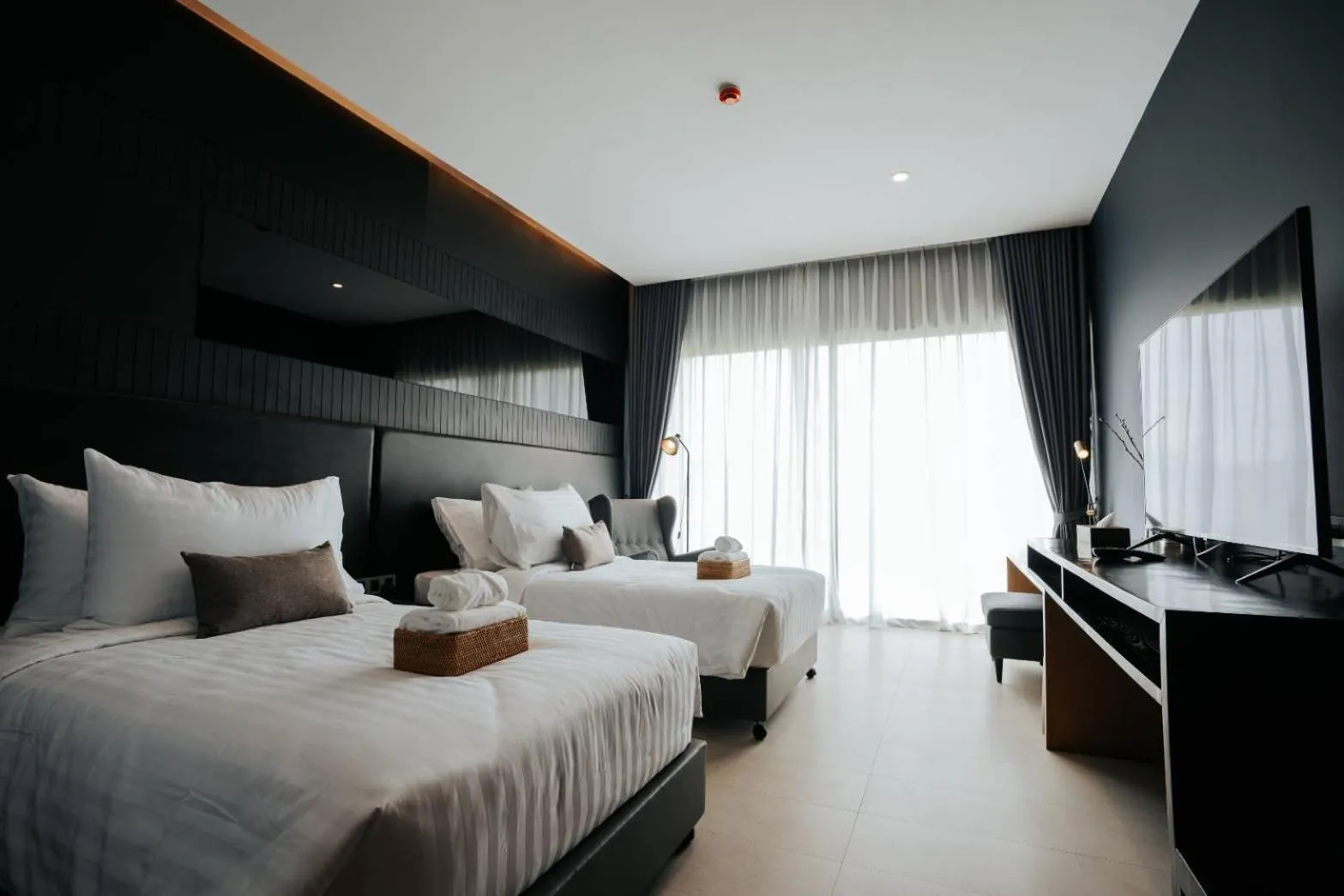 Bed in The Grandiose Hotel Chiang Rai เดอะแกรนด์ดิโอสเชียงราย