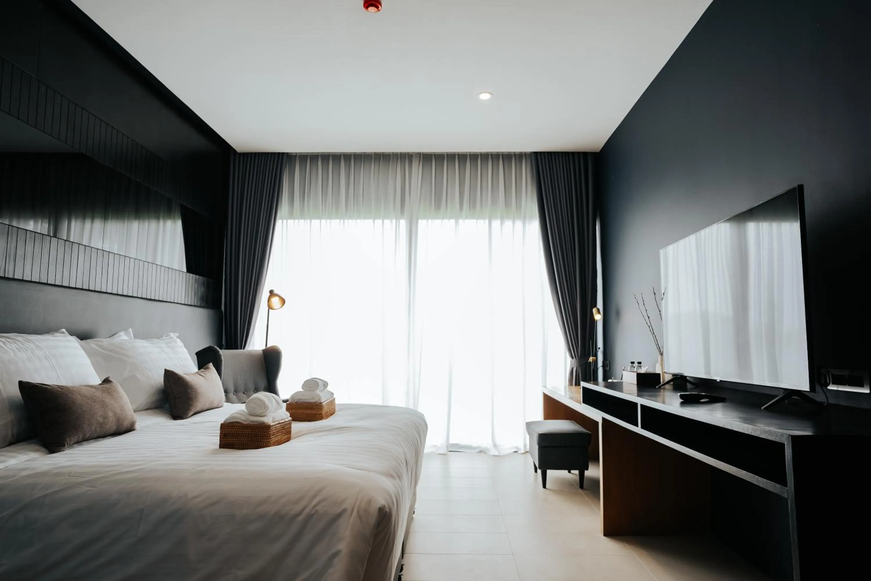 Bed in The Grandiose Hotel Chiang Rai เดอะแกรนด์ดิโอสเชียงราย