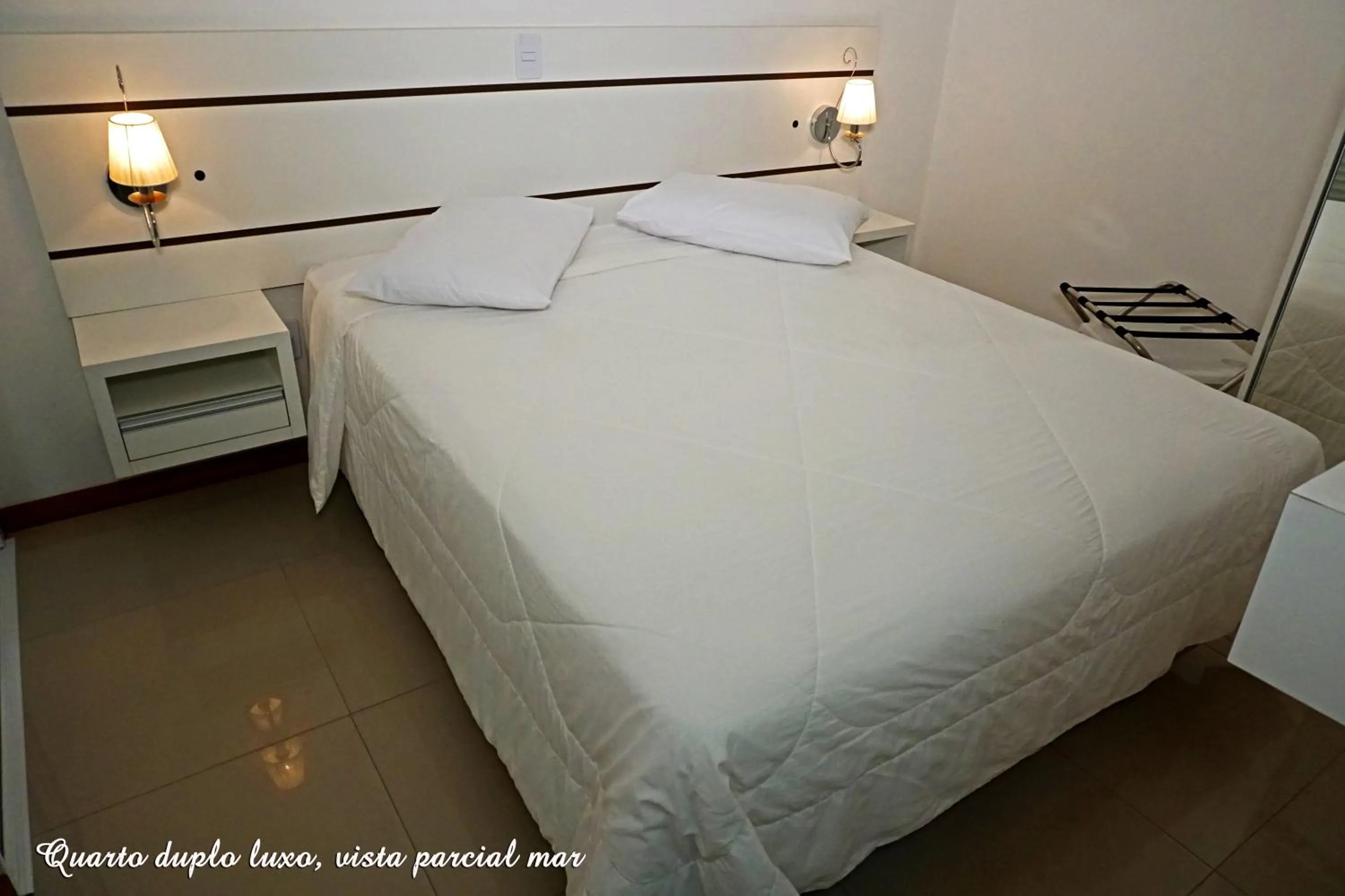 Bed in Pousada Molhes da Barra