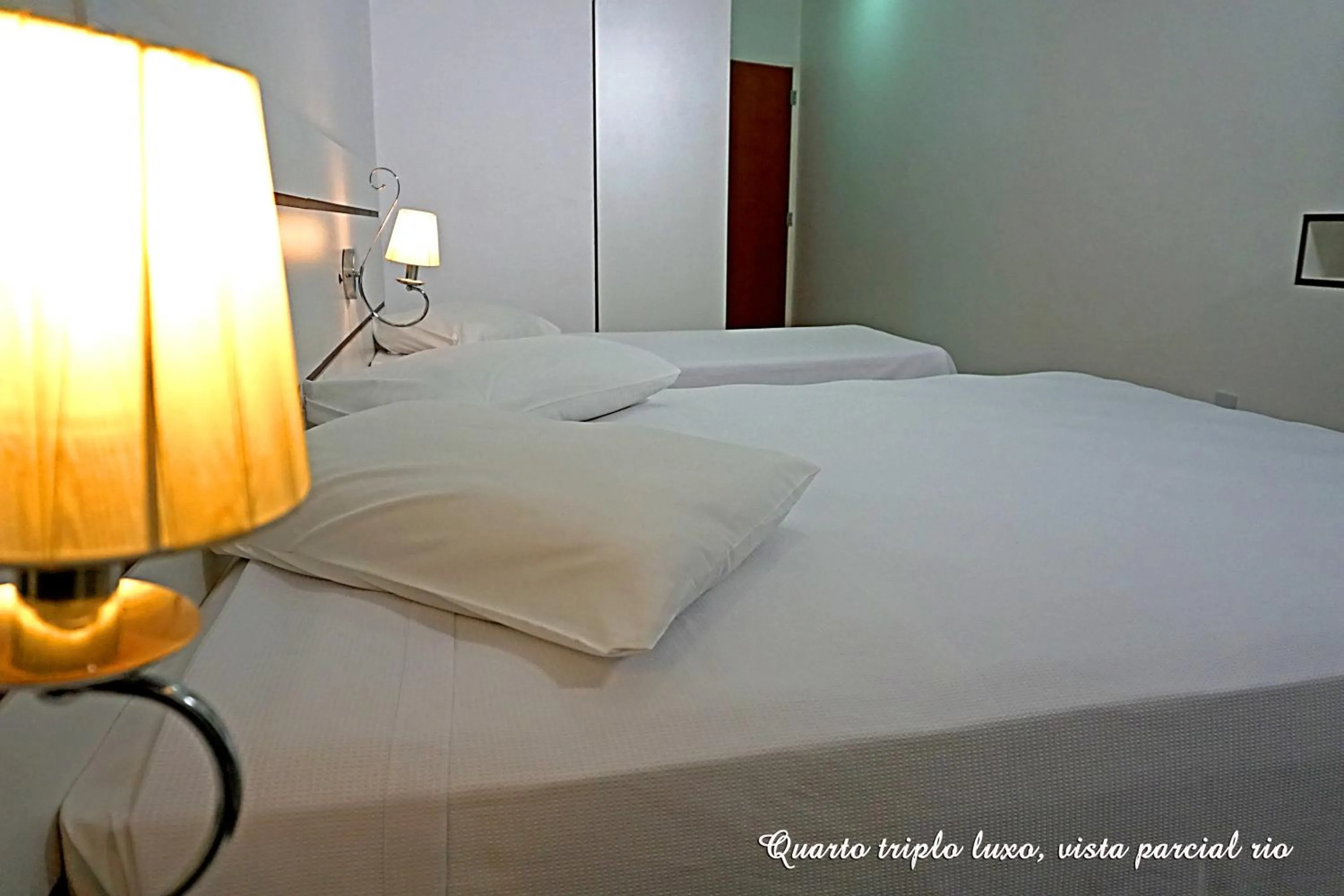 Bed in Pousada Molhes da Barra