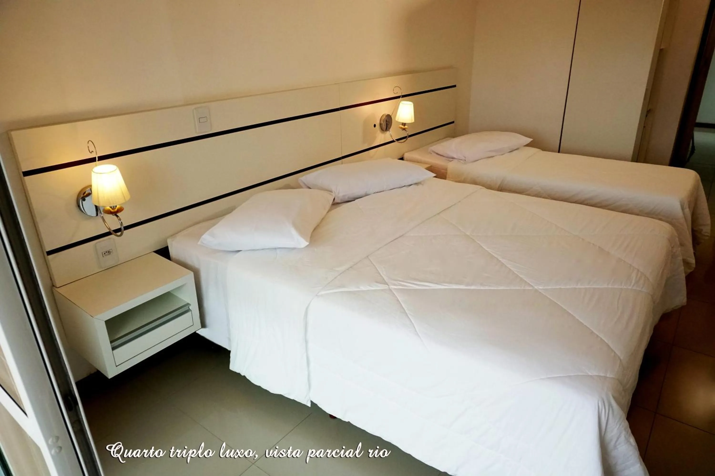 Bed in Pousada Molhes da Barra