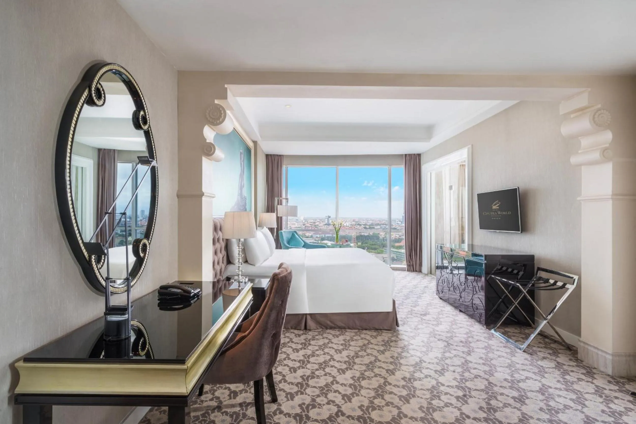 Seating area, Bed in Hotel Ciputra World Surabaya managed by Swiss-Belhotel International