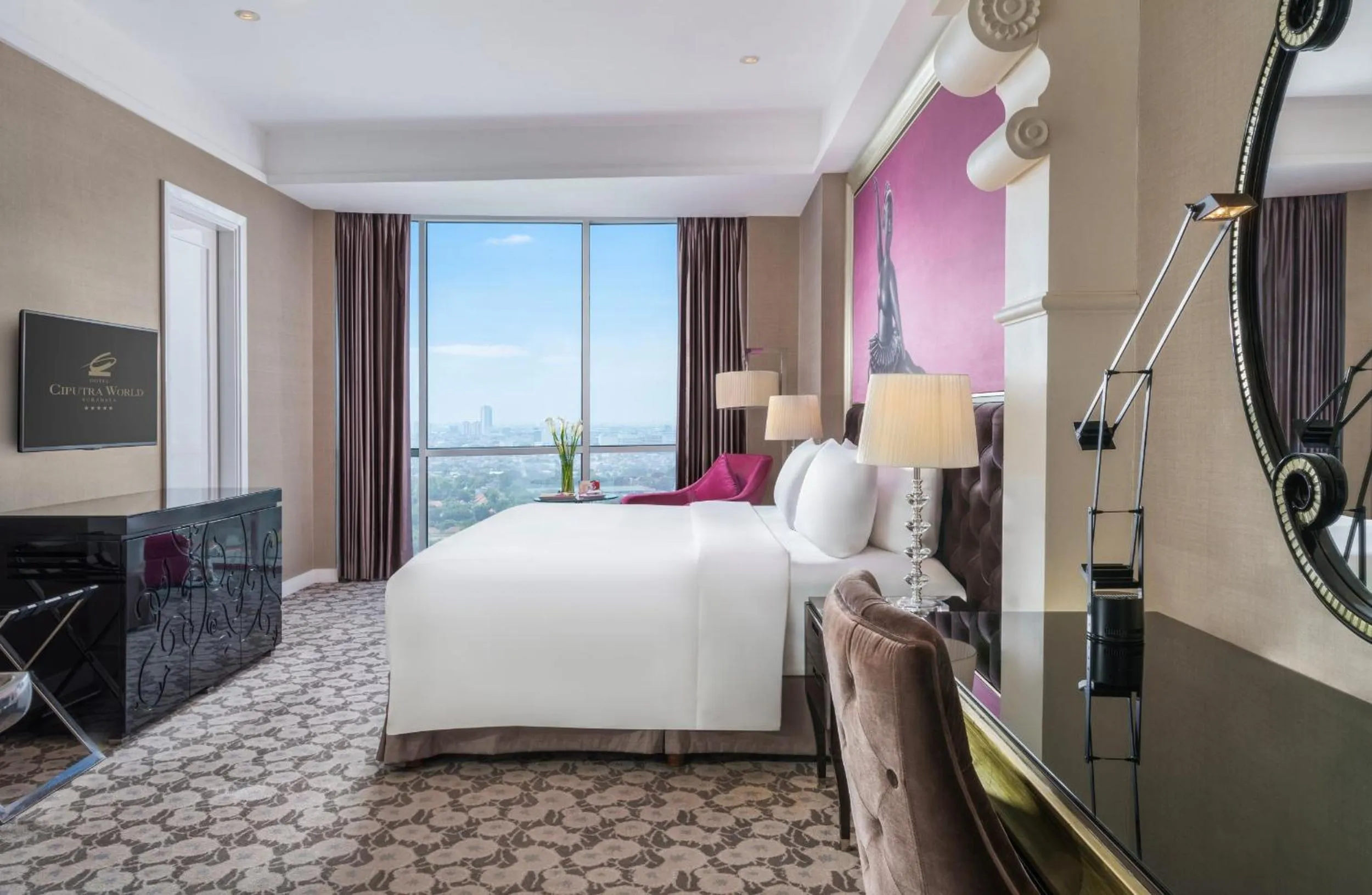 TV and multimedia, Bed in Hotel Ciputra World Surabaya managed by Swiss-Belhotel International