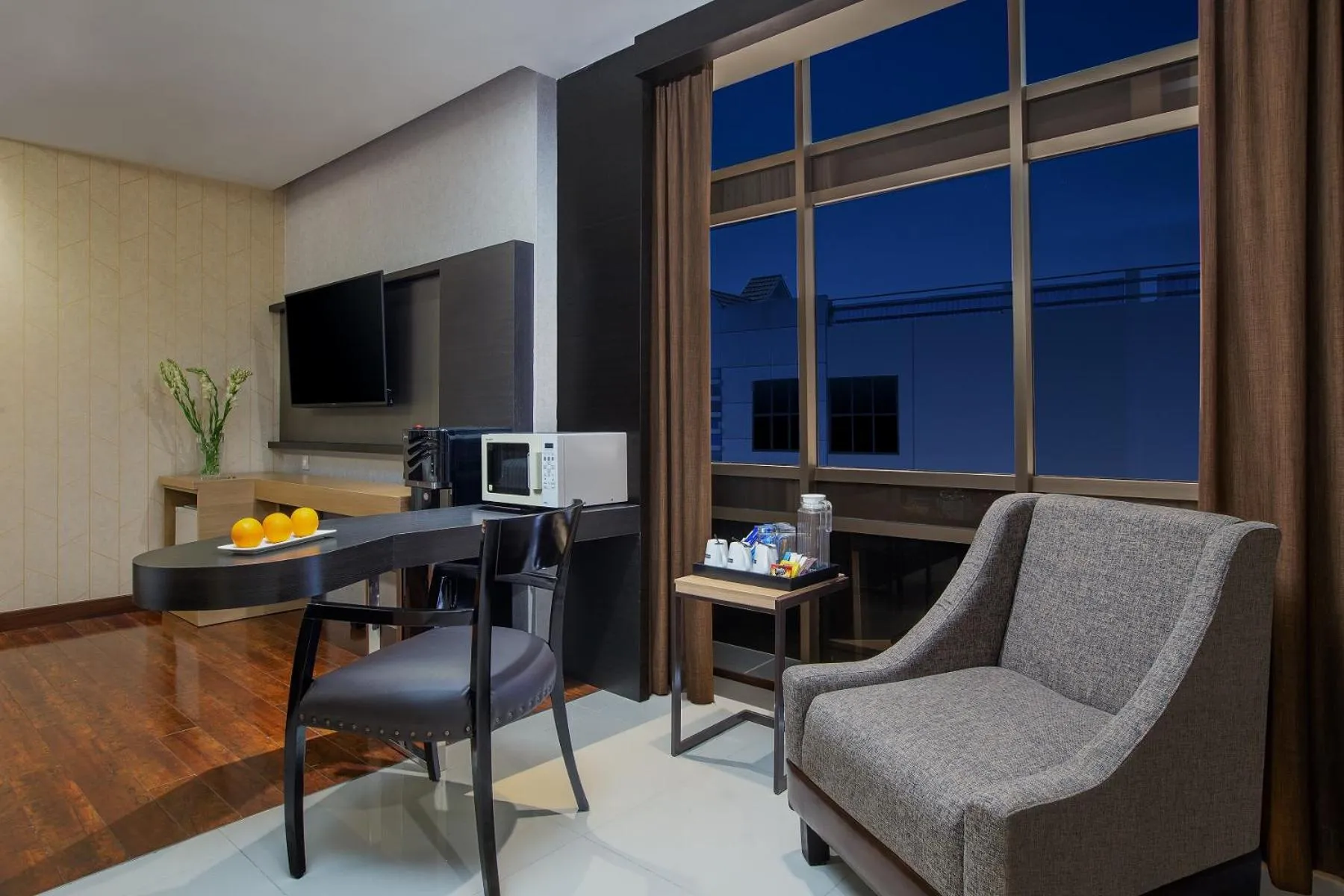 Seating area in Harper Malioboro Yogyakarta by ASTON