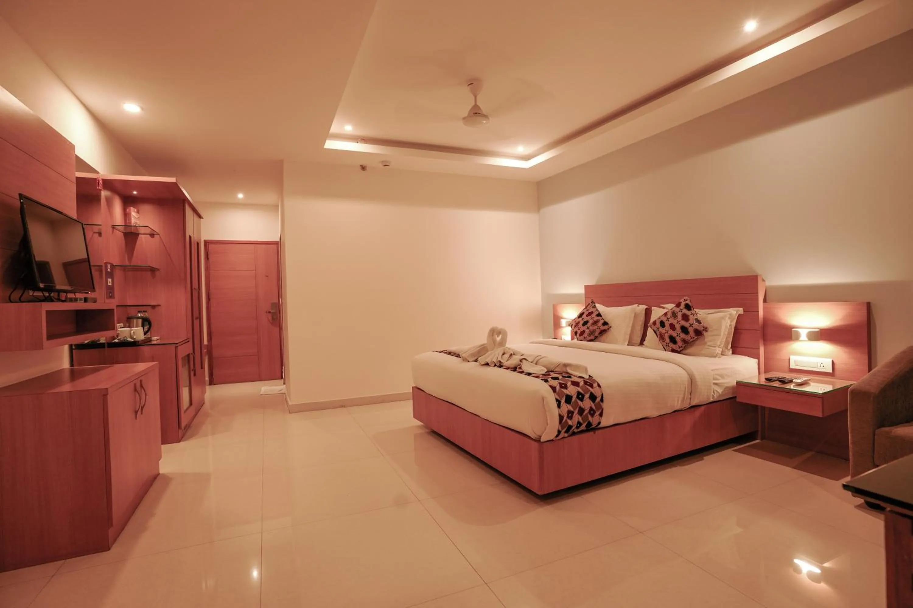 Bed in Hotel Indriya Wayanad