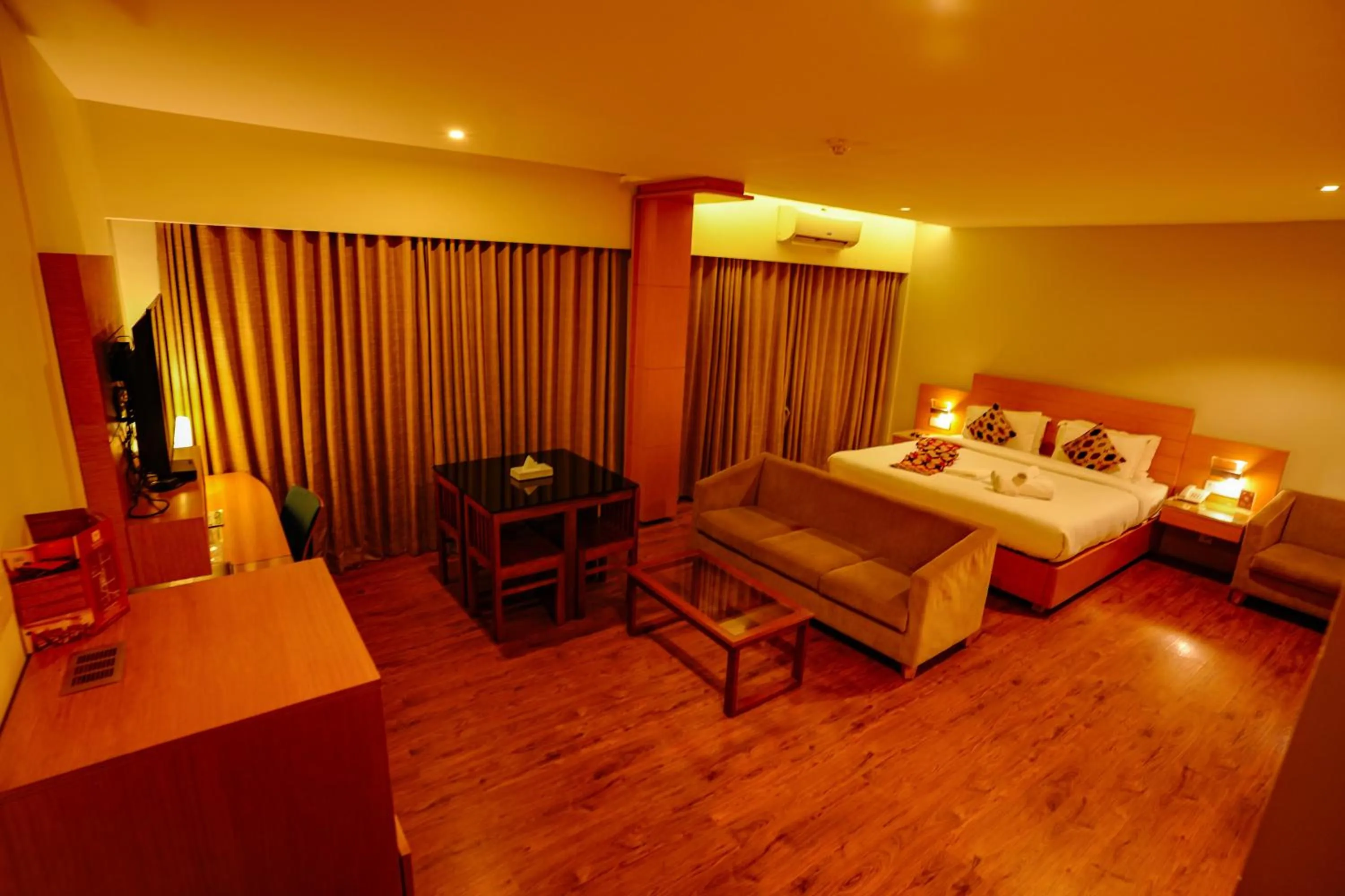 Photo of the whole room, Bed in Hotel Indriya Wayanad