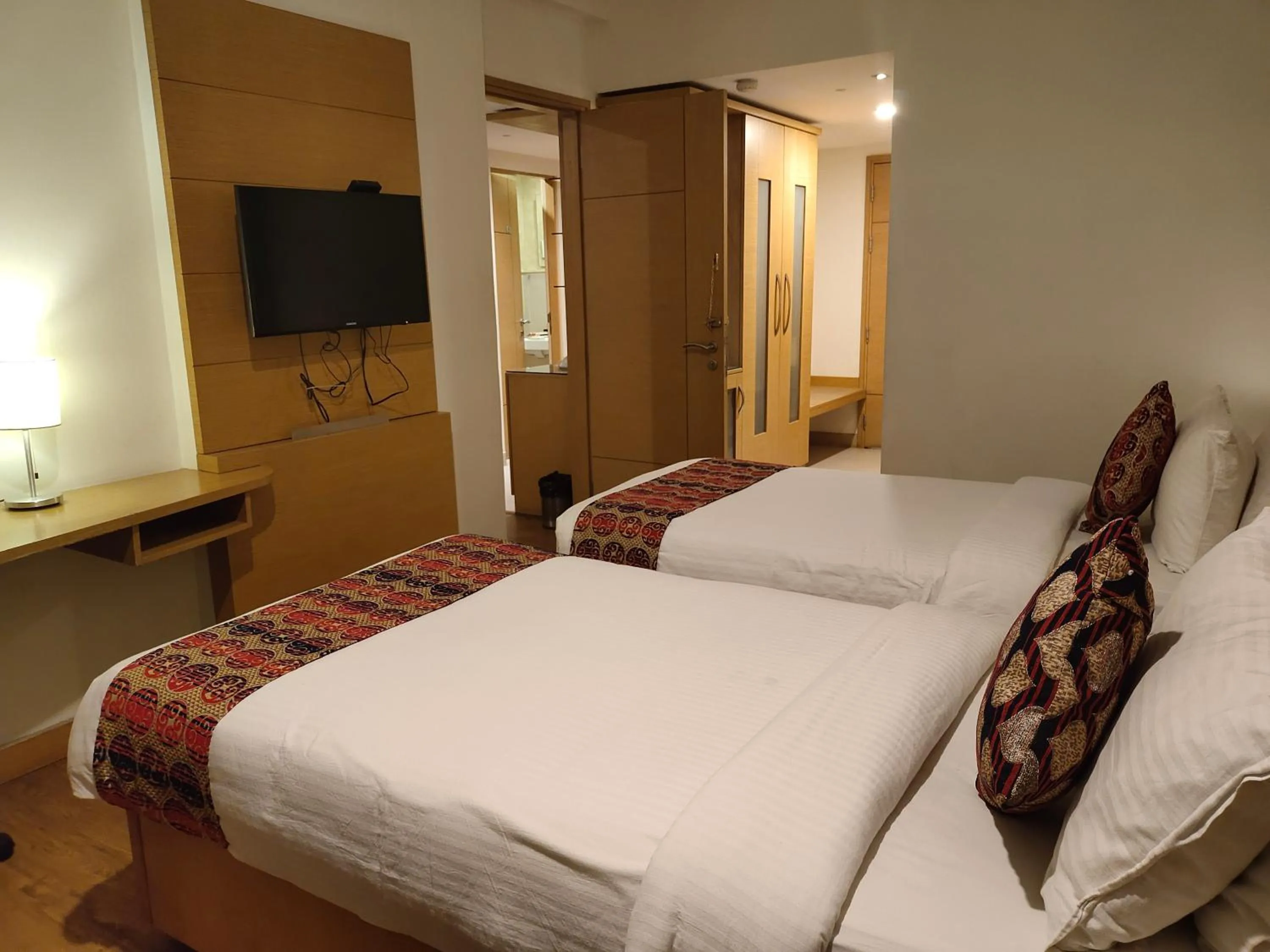 Bed in Hotel Indriya Wayanad