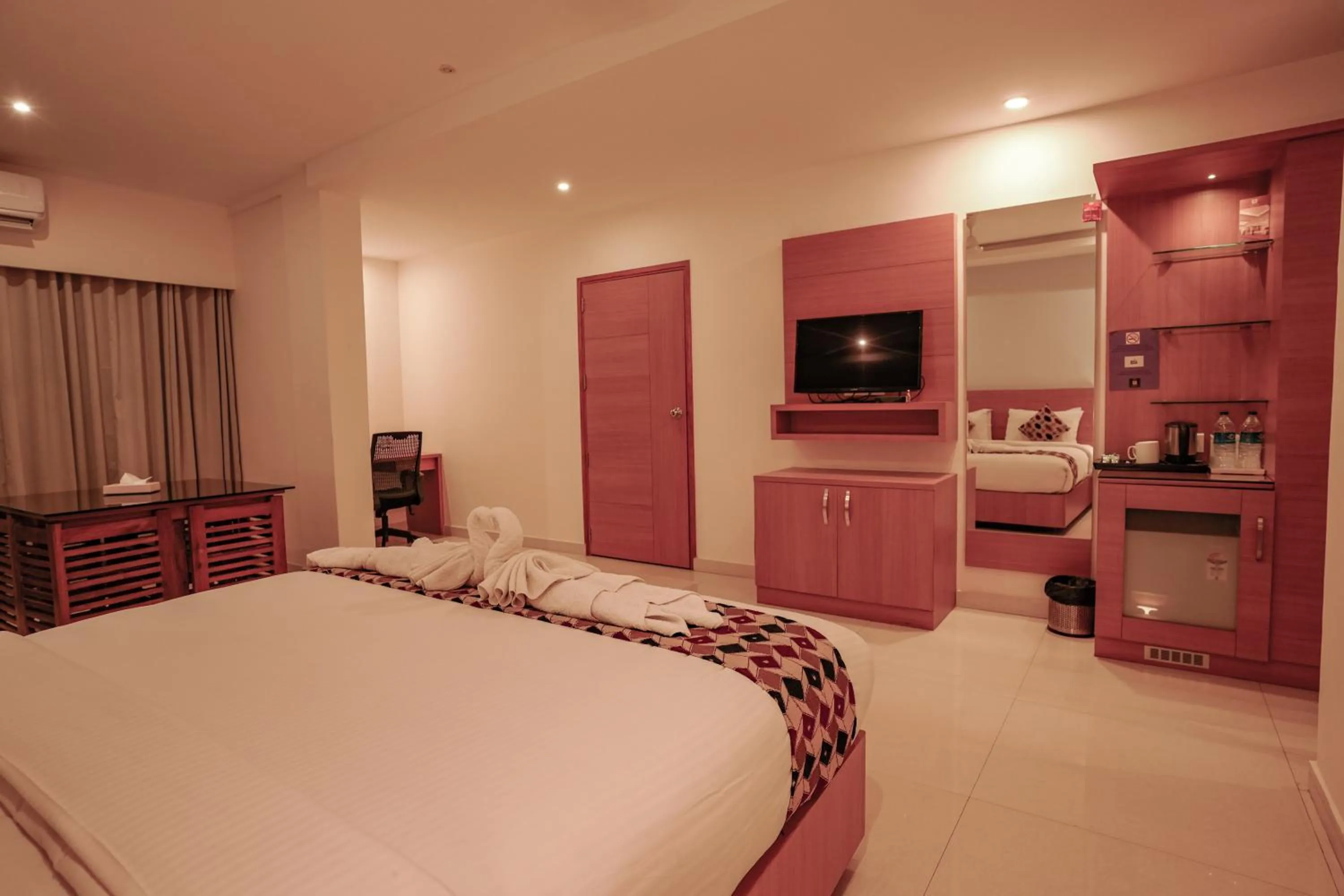 Bed in Hotel Indriya Wayanad