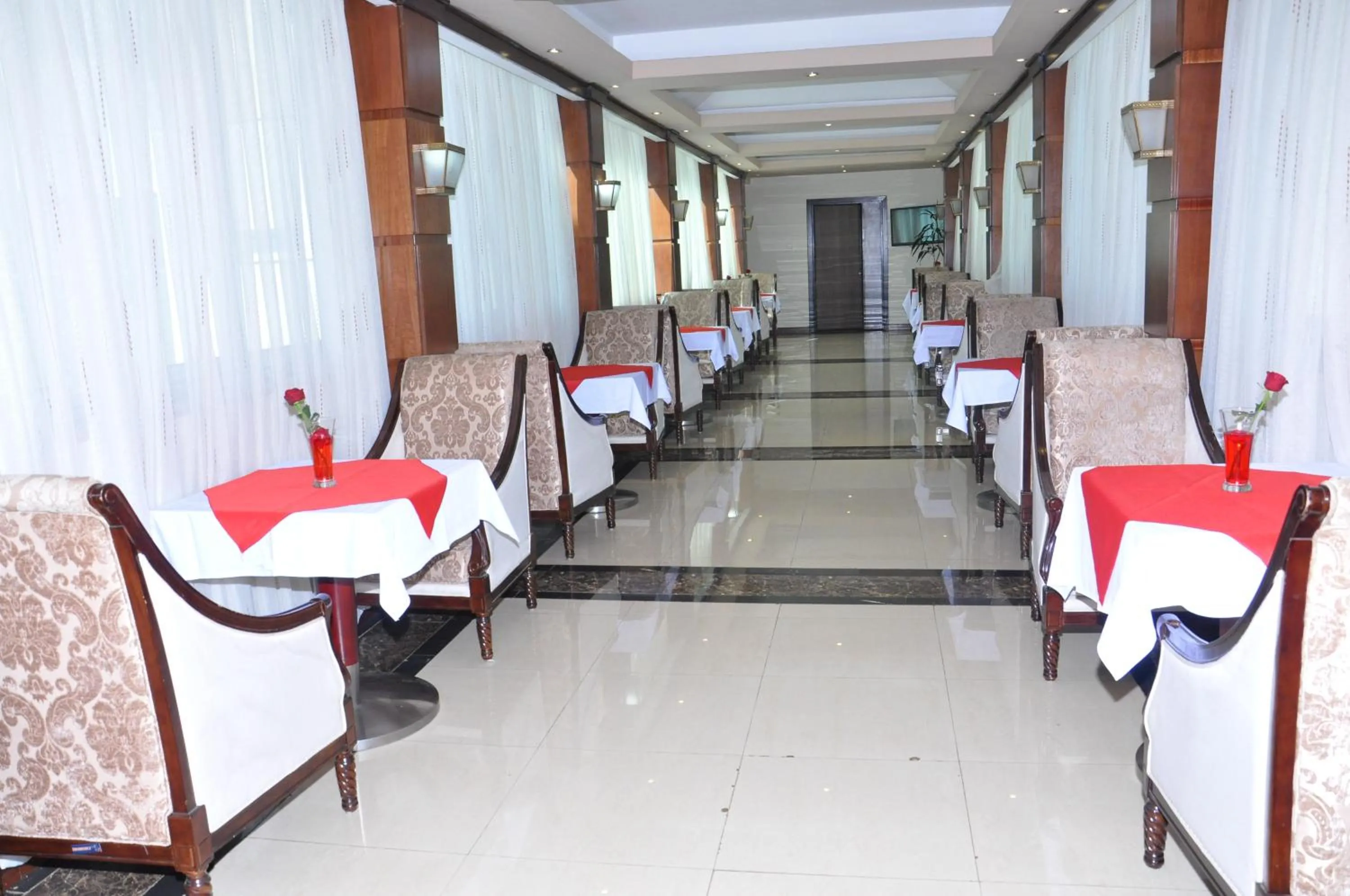 Dining area in Elilly International Hotel