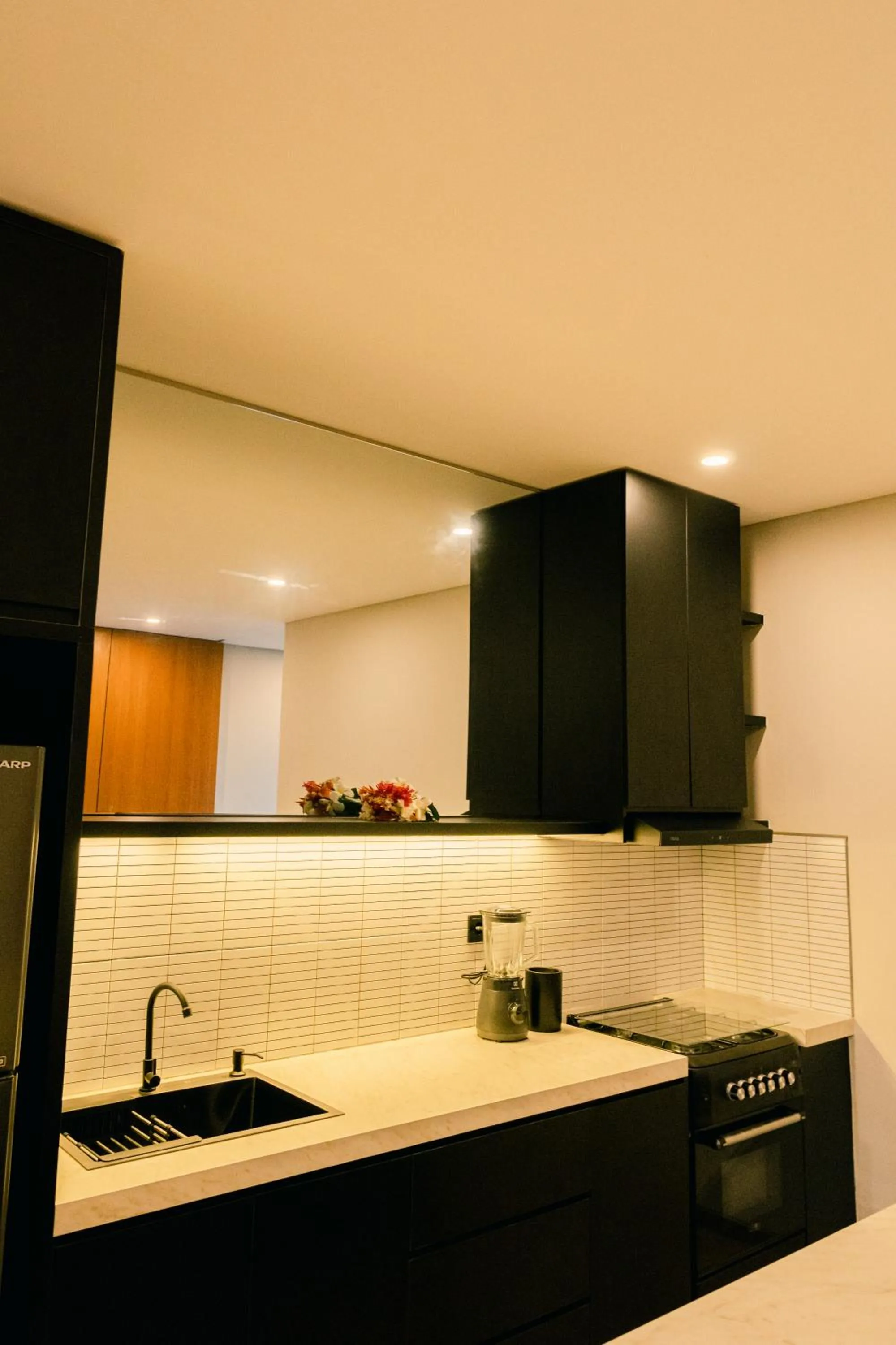 Kitchen or kitchenette in The Menuai Bali Villas Canggu