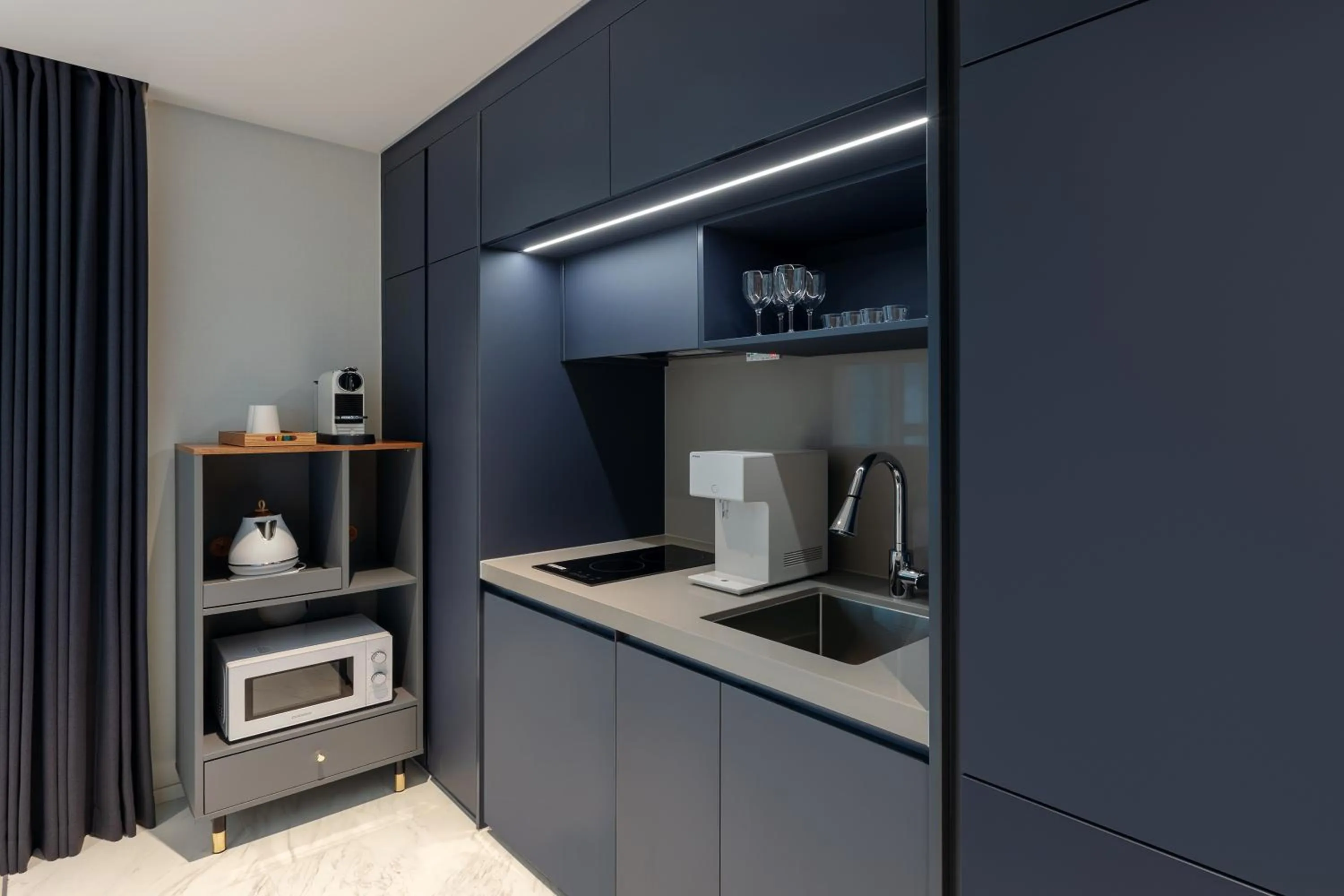 Kitchen or kitchenette in NewCZ Haeundae Residence