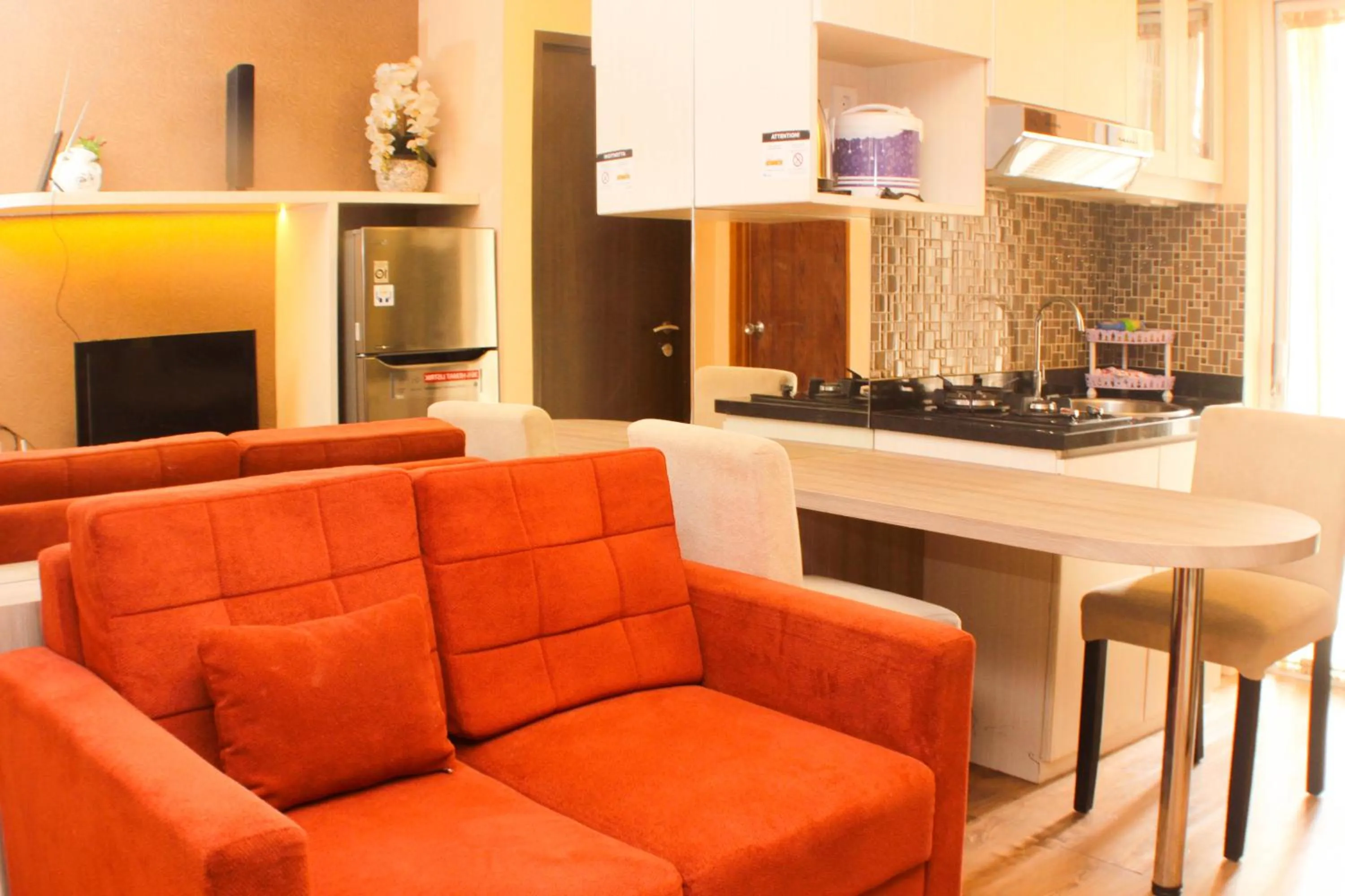Kitchen or kitchenette in Strategic and Simply 2BR at Bassura City Apartment By Travelio