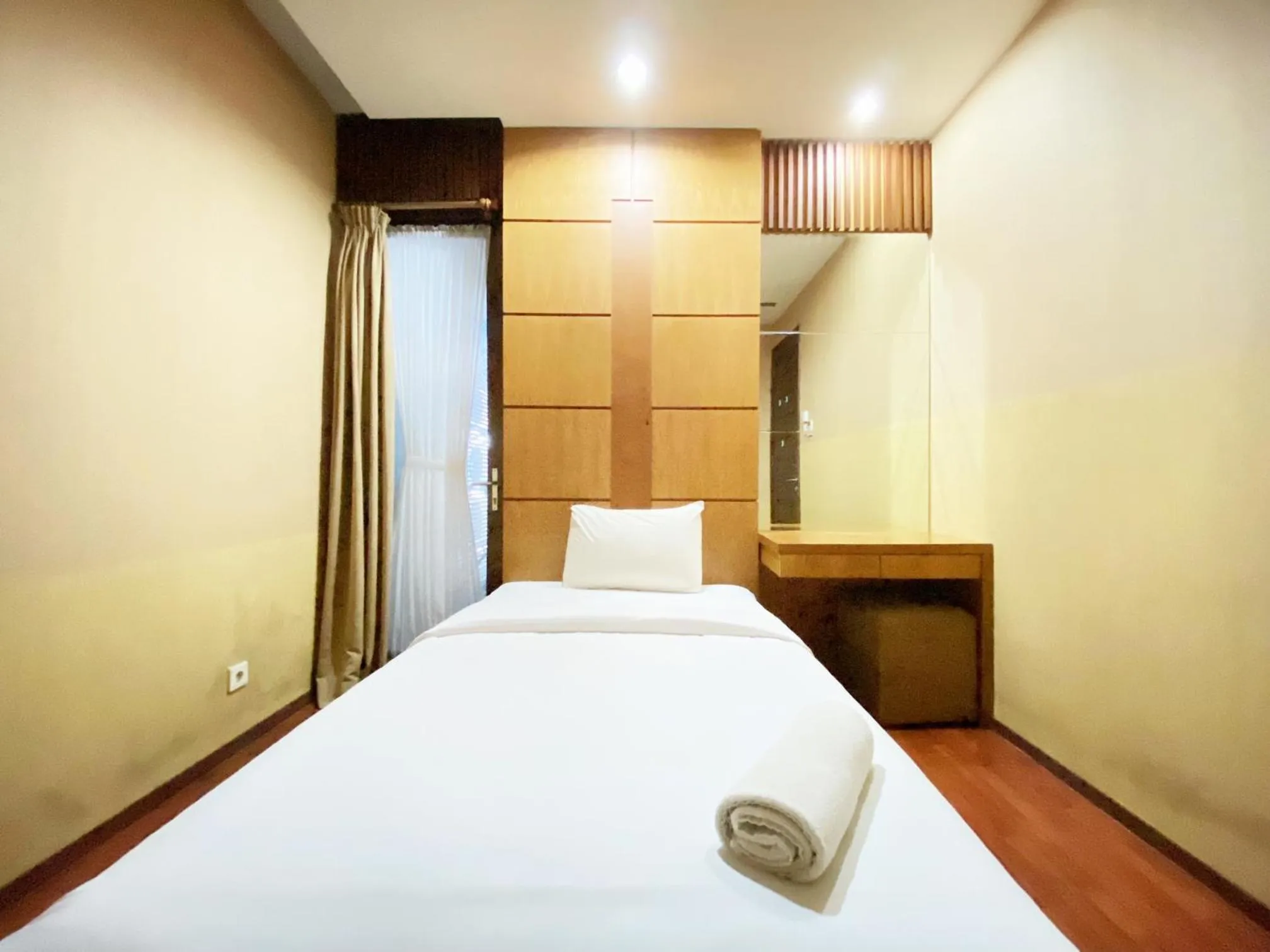 Bed in Spacious 2BR at Dago Butik Apartment By Travelio
