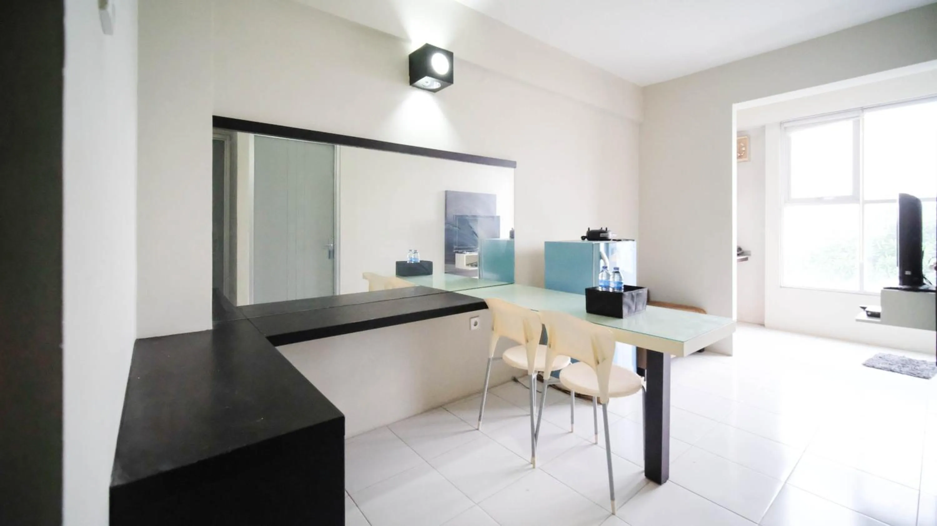 Homey and Comfy 2BR at Dian Regency Apartment By Travelio
