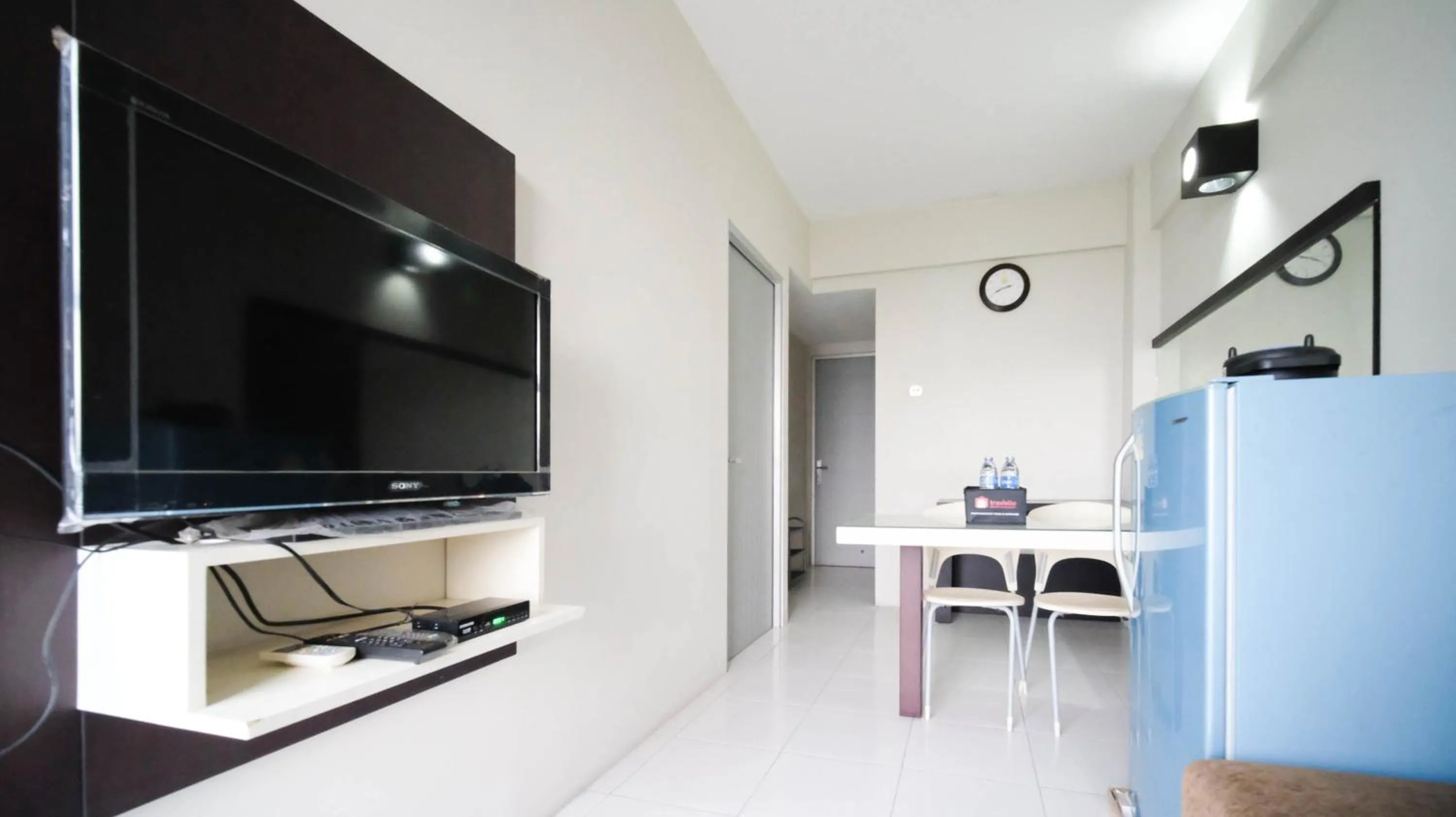 Homey and Comfy 2BR at Dian Regency Apartment By Travelio